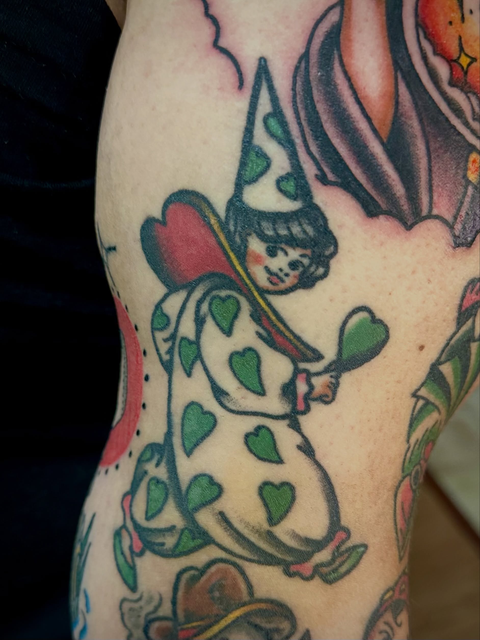 Queen of hearts American traditional tattoo on the forearm by Josh Robinson
