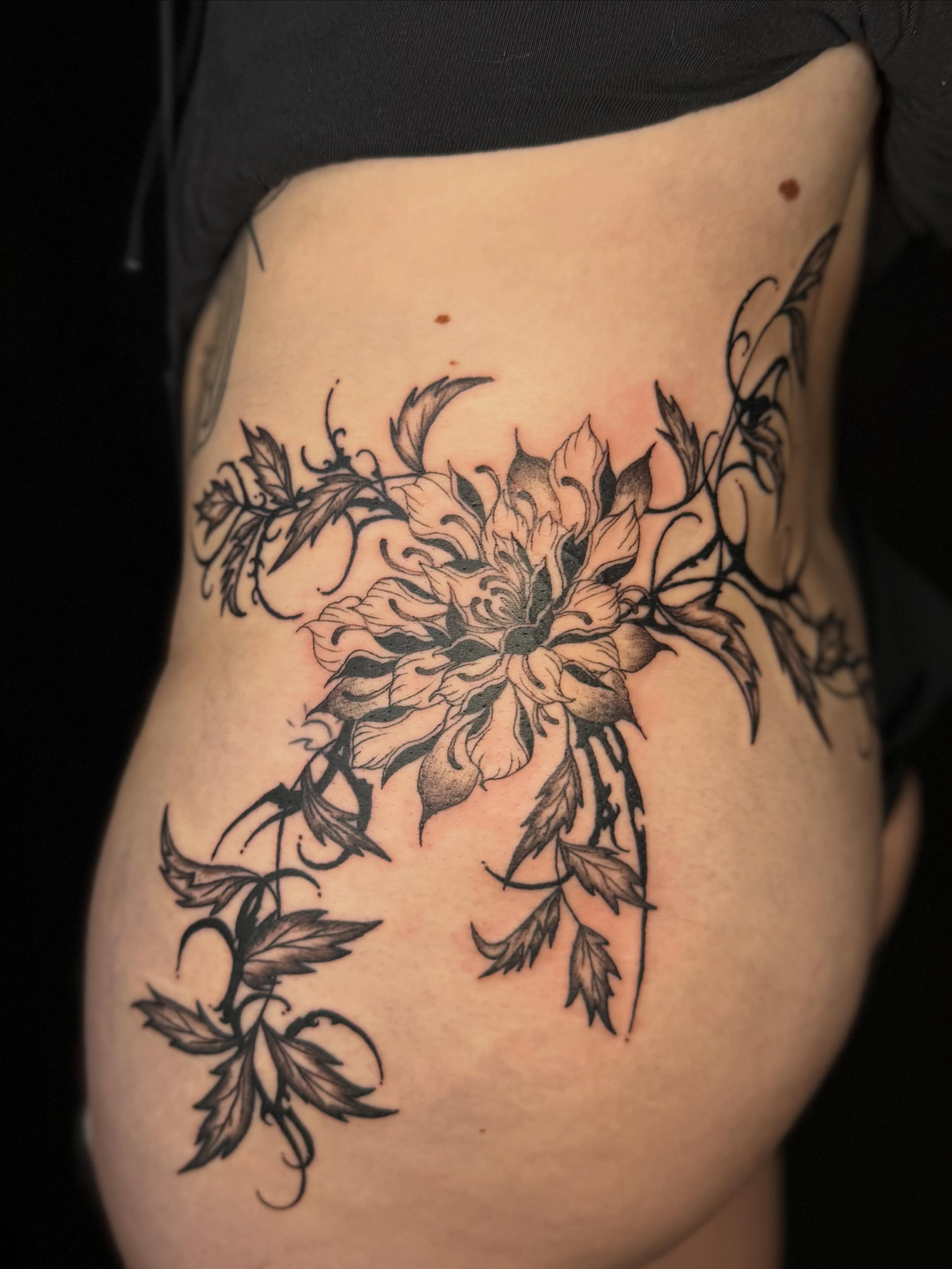 Floral design black and grey tattoo on the ribs by Jocelyne ♡