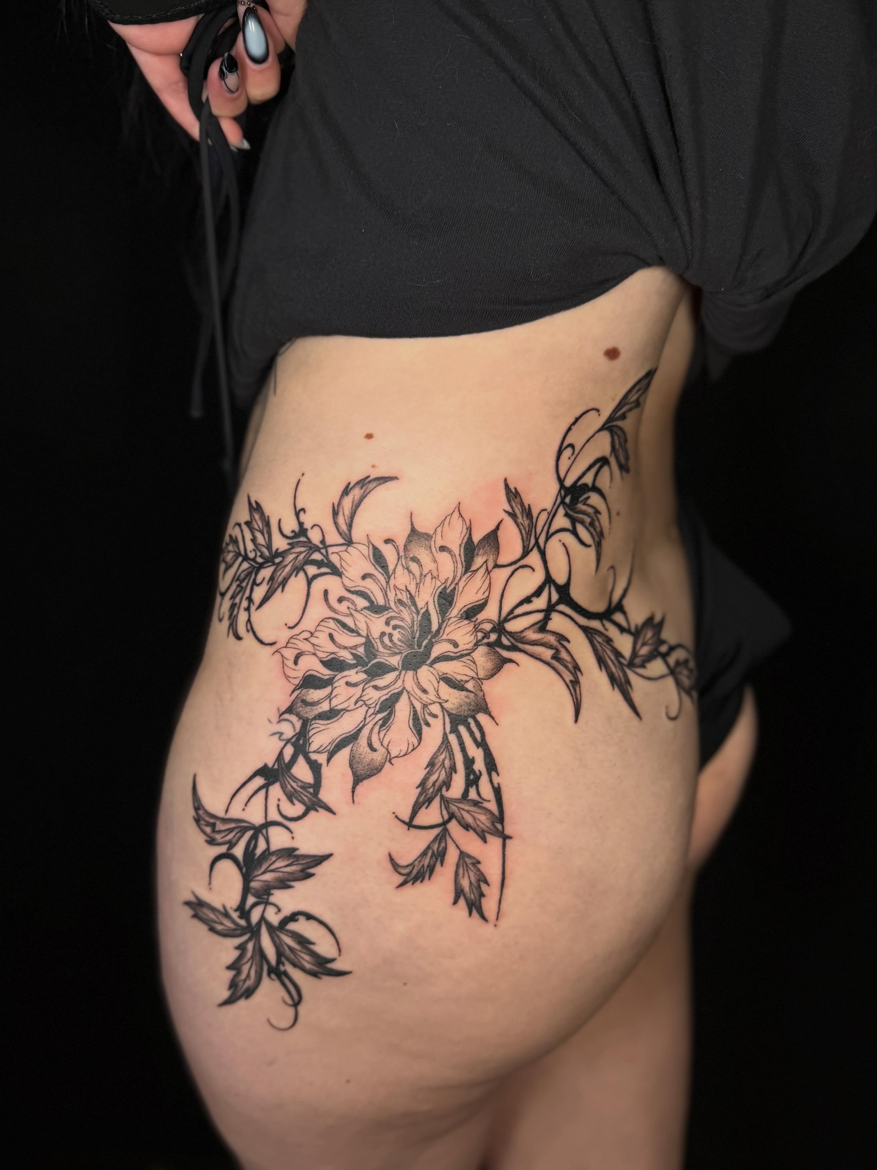 Floral design black and grey tattoo on the thigh by Jocelyne ♡