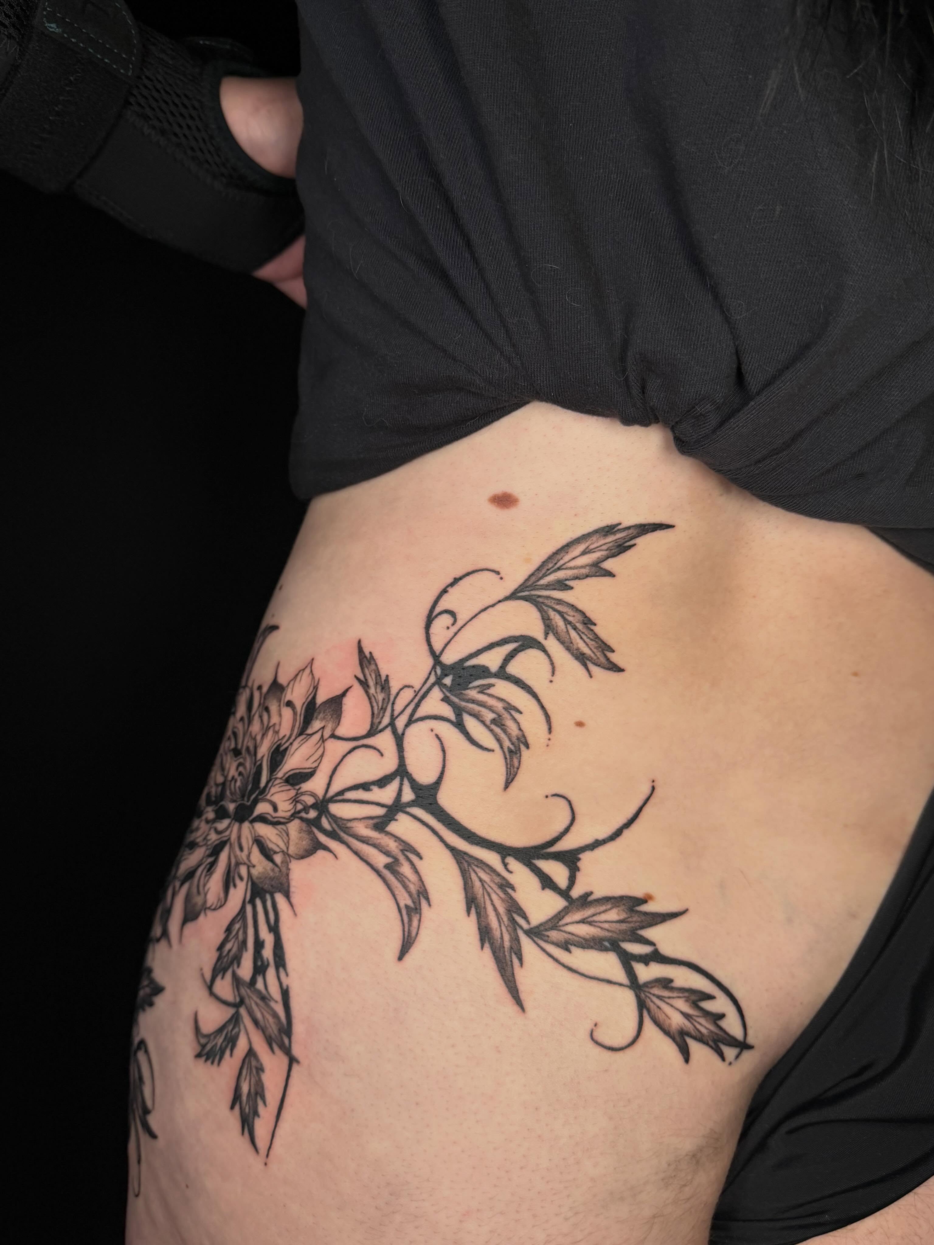 Floral design black and grey tattoo on the ribs by Jocelyne ♡