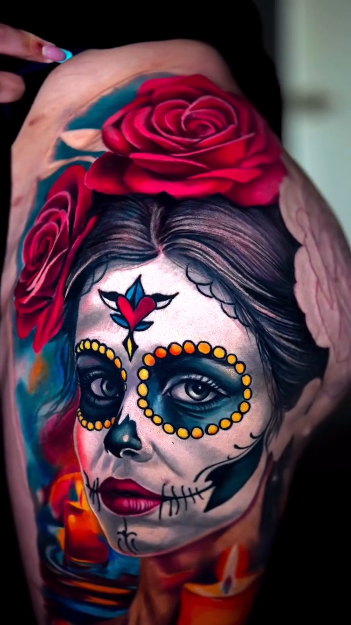 Surrealism tattoo on the upper arm by Yasmani ramirez