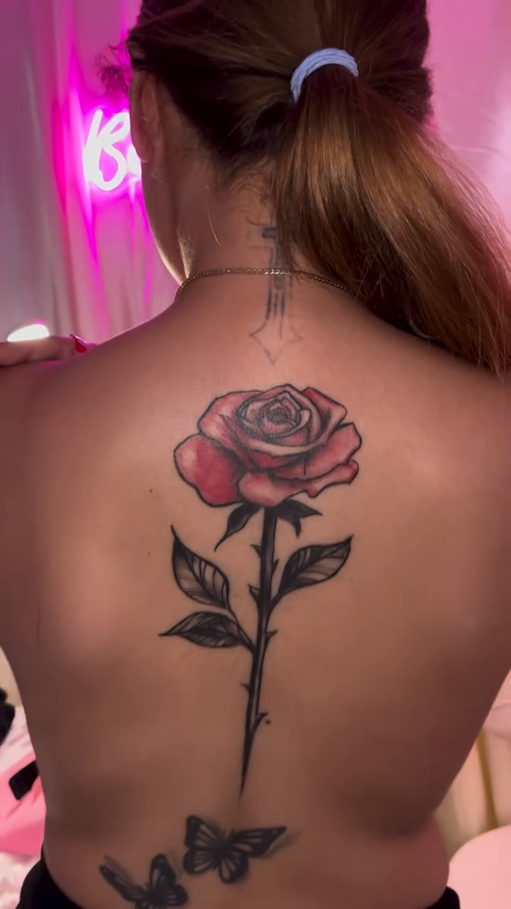 Rose with butterflies neo-traditional tattoo on the back by Tattoomobile