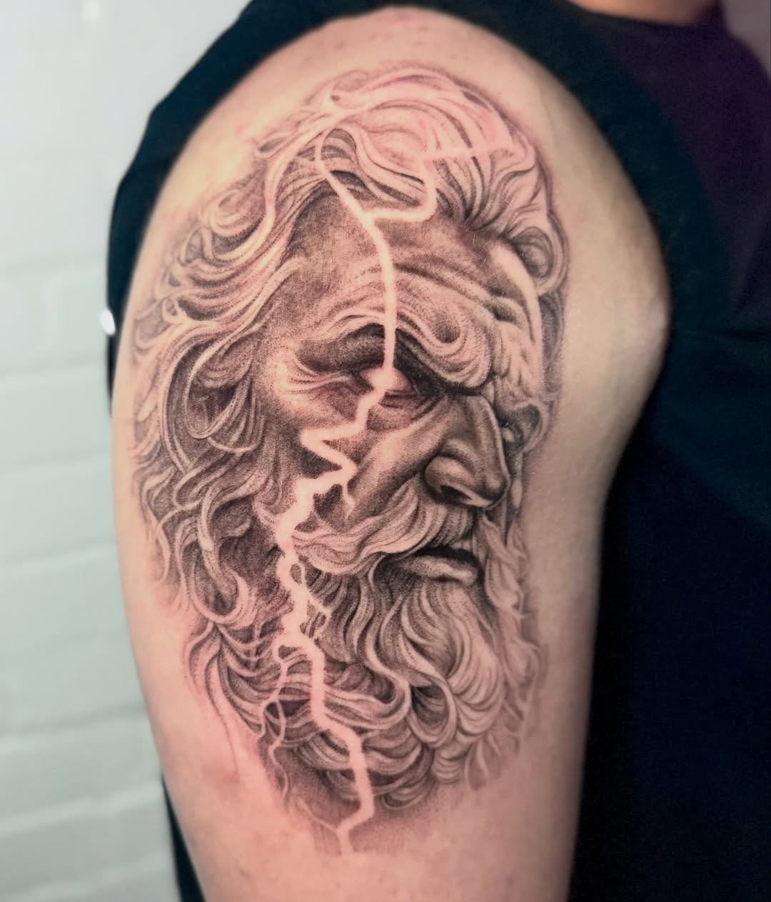 Tattoo by @tattoosbybradi — realism, black_and_grey
