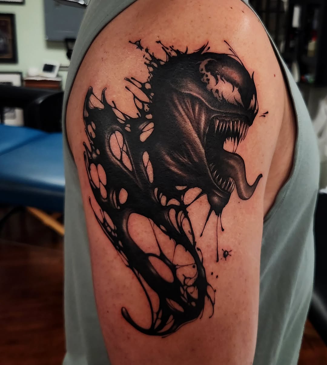 Tattoo by @stone_man720 — black_and_grey, dark_realism