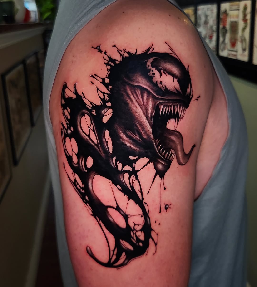 Tattoo by @stone_man720 — black_and_grey, realism