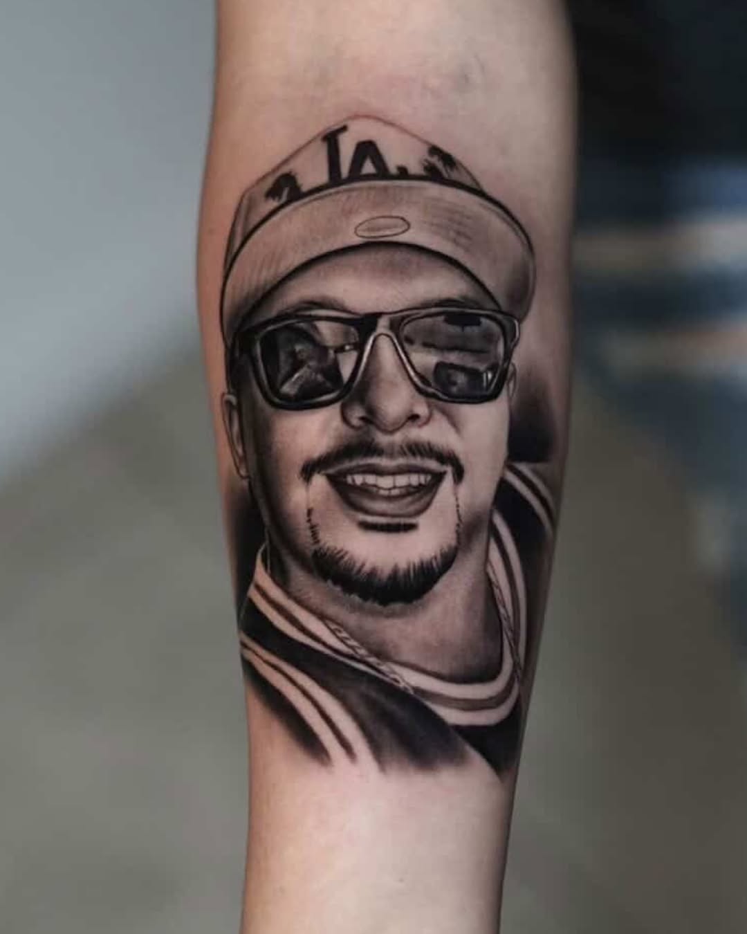 Chicano tattoo on the forearm by Luis Peña