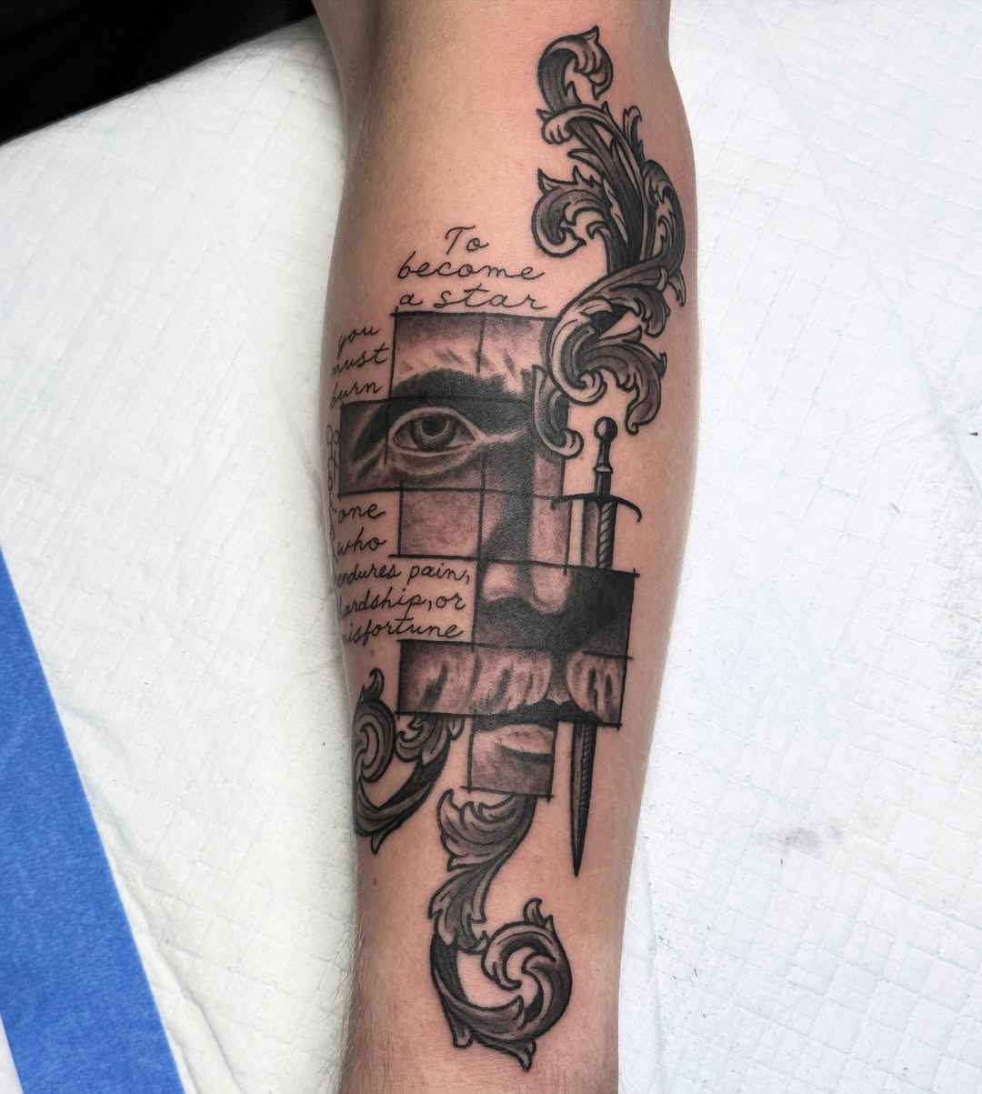 Eye and sword realism tattoo on the forearm by Timothy Kenee