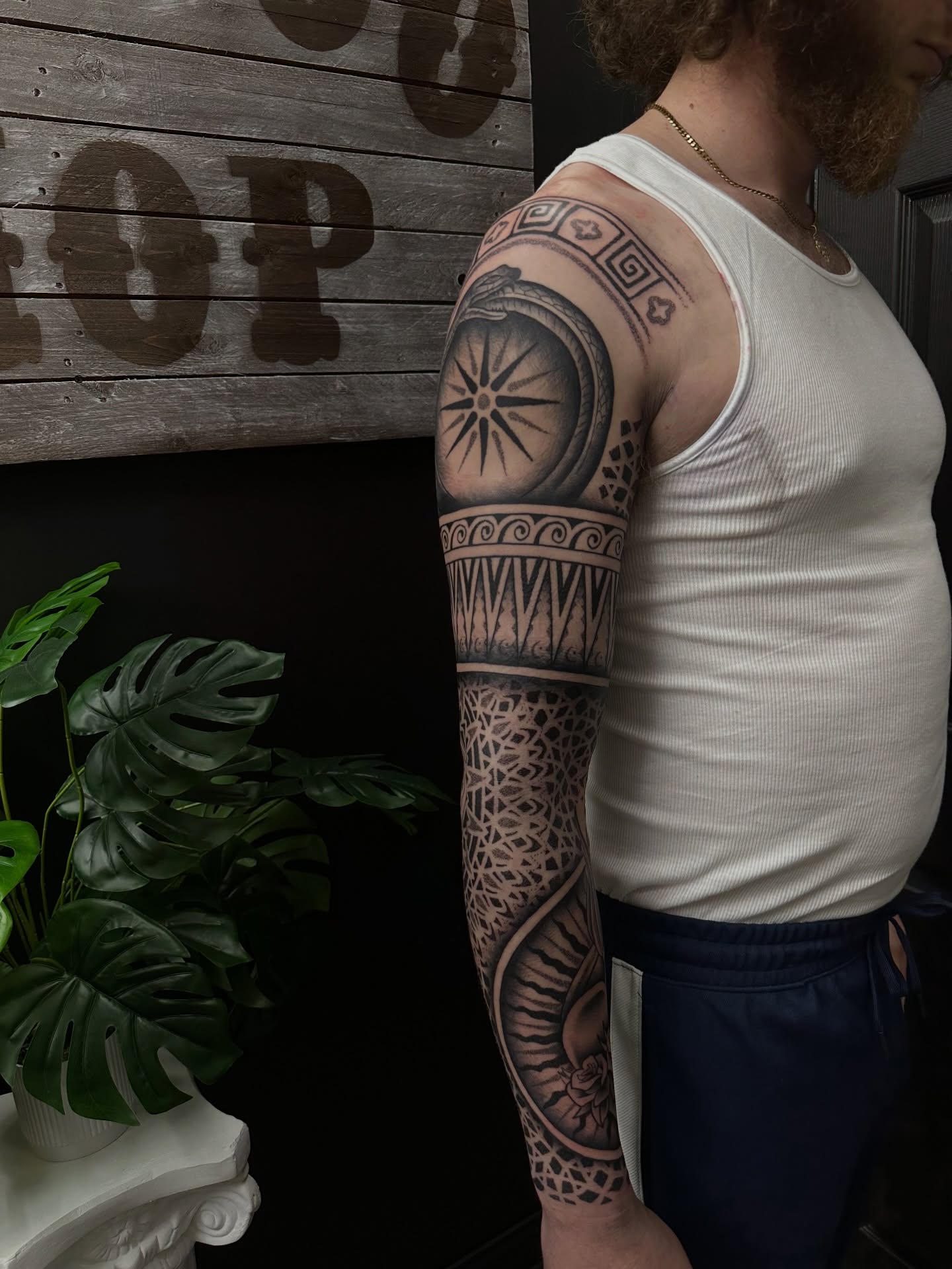 Tribal motifs tribal tattoo on the forearm by Tyler Renfrow