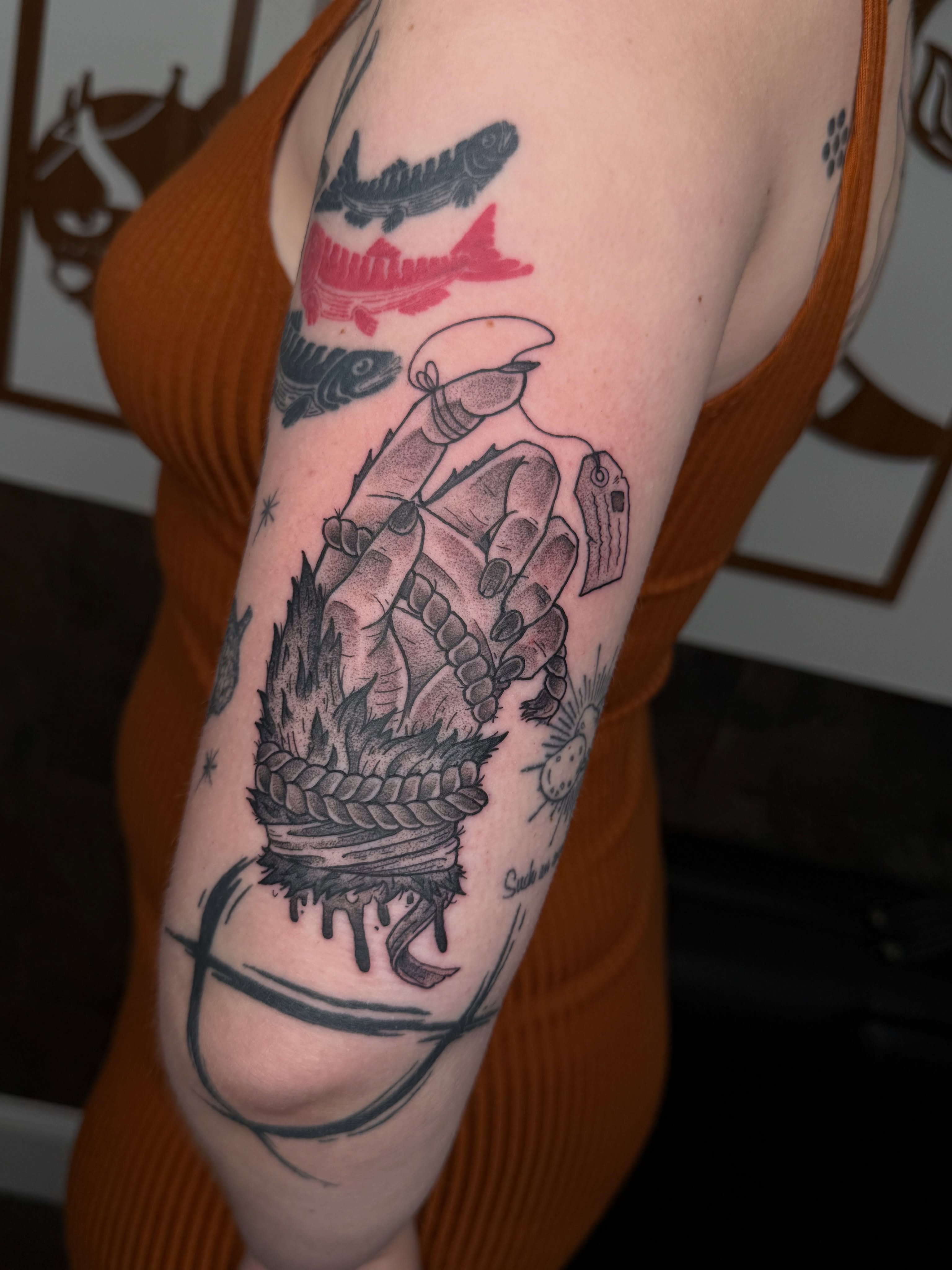 Rope and anchor black and grey tattoo on the forearm by Jezza Munson