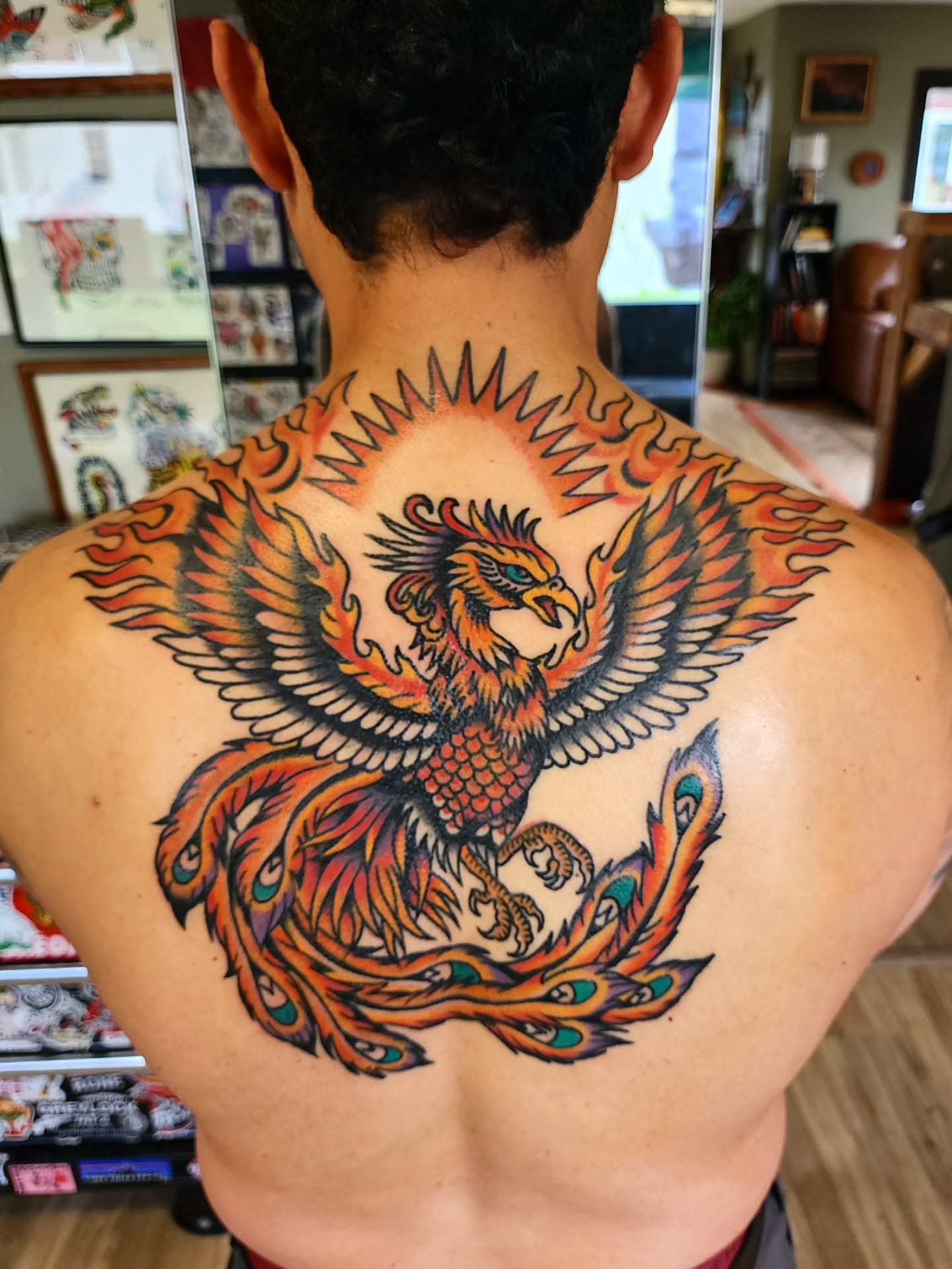 Phoenix American traditional tattoo on the back by πππππ