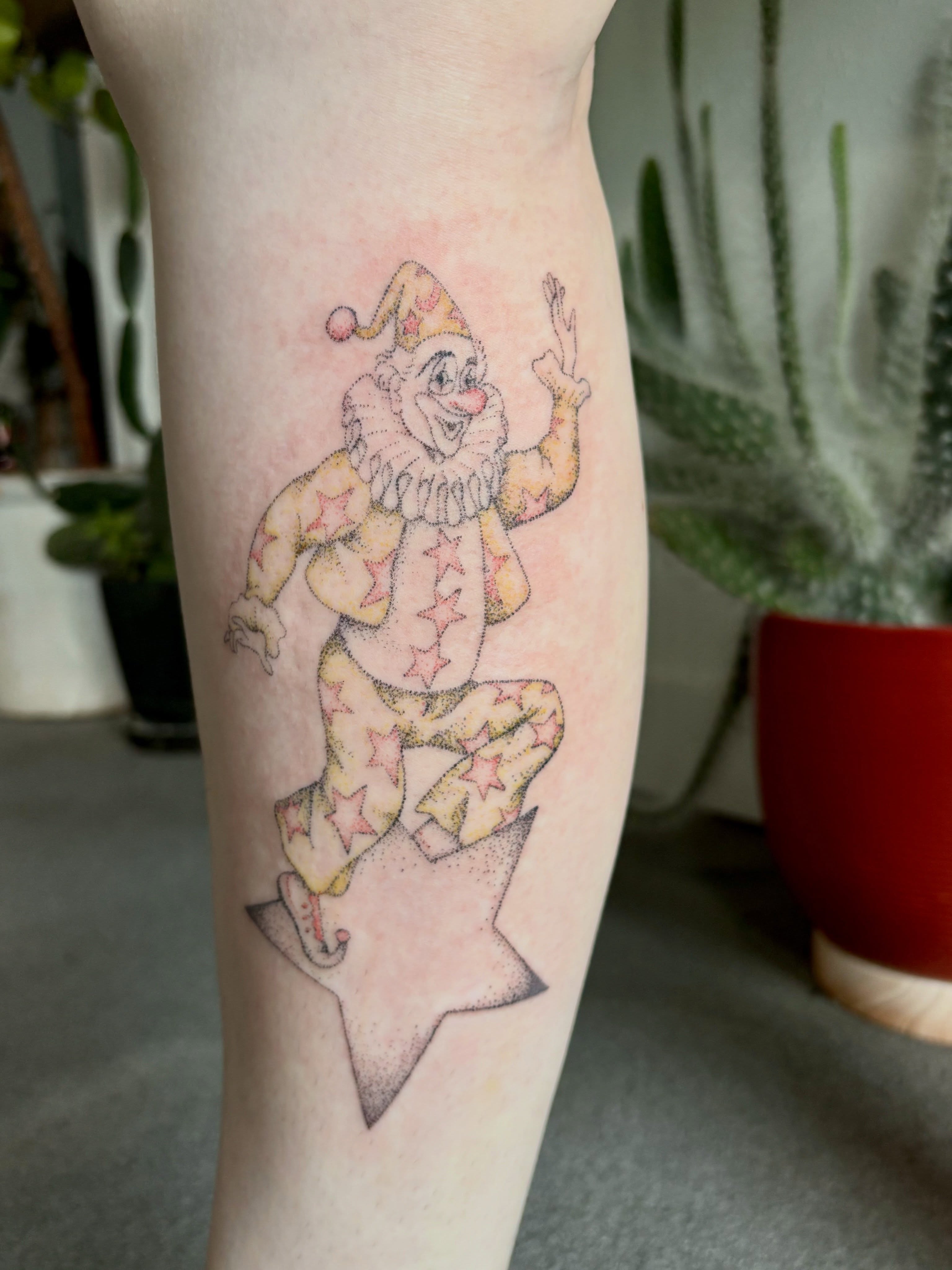 Clown on star dotwork tattoo on the forearm by Ashley, Elk Horn, Iowa