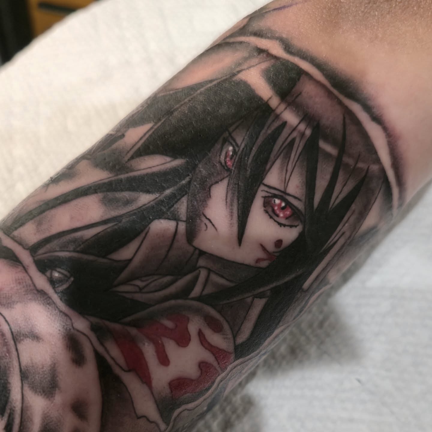 Anime character anime tattoo on the forearm by Tattoo Artist, Orange, California