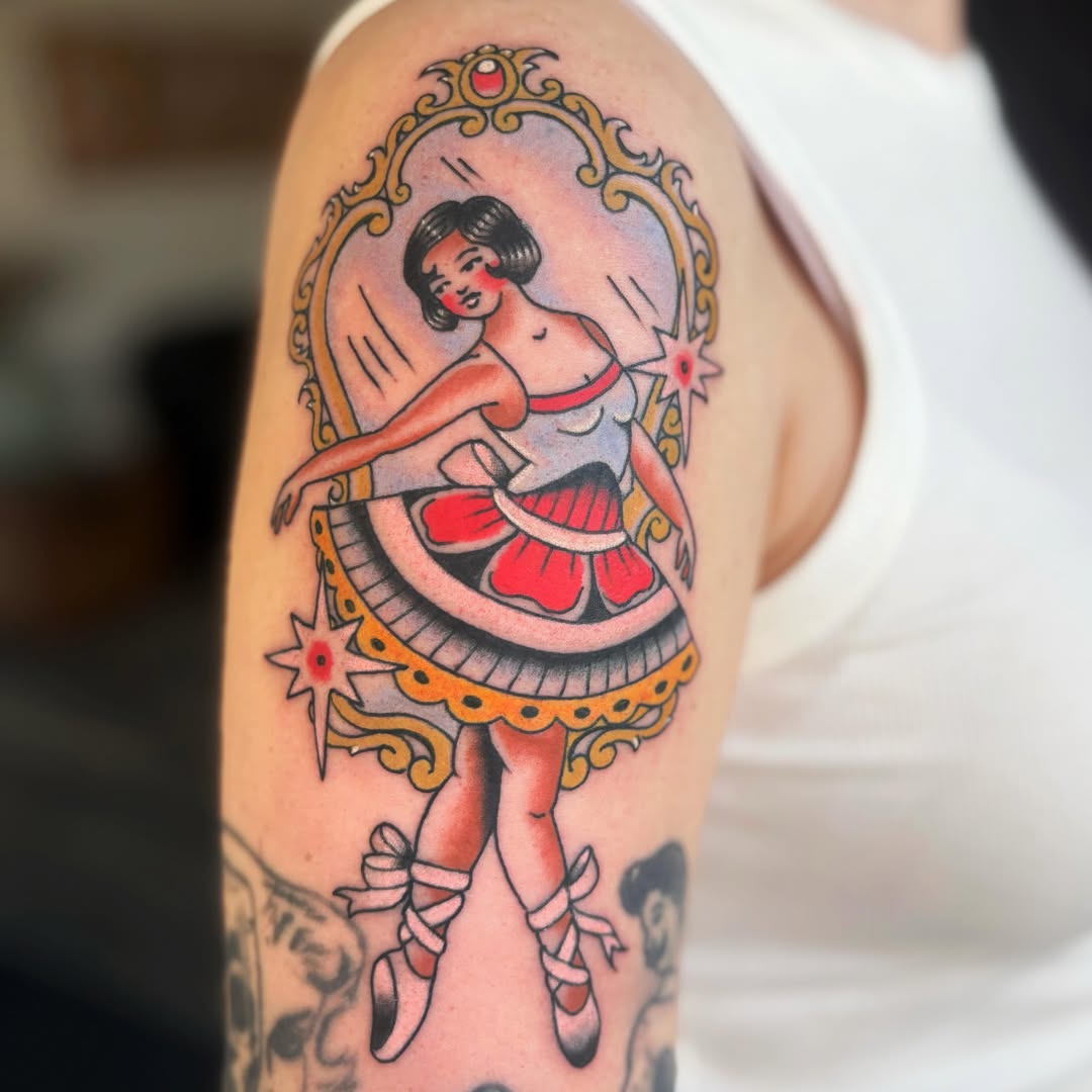 Ballerina American traditional tattoo on the upper arm by Caeli Martin