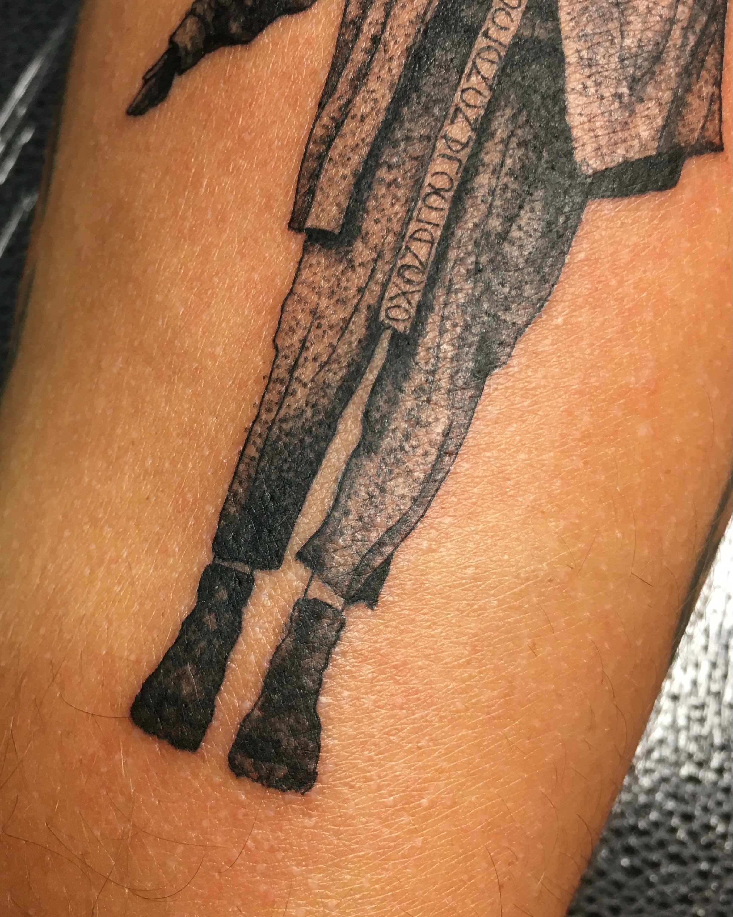 Gun black and grey tattoo on the forearm by Nahomi Luna - Memphis & Cordova Tattoo, Memphis, Tennessee