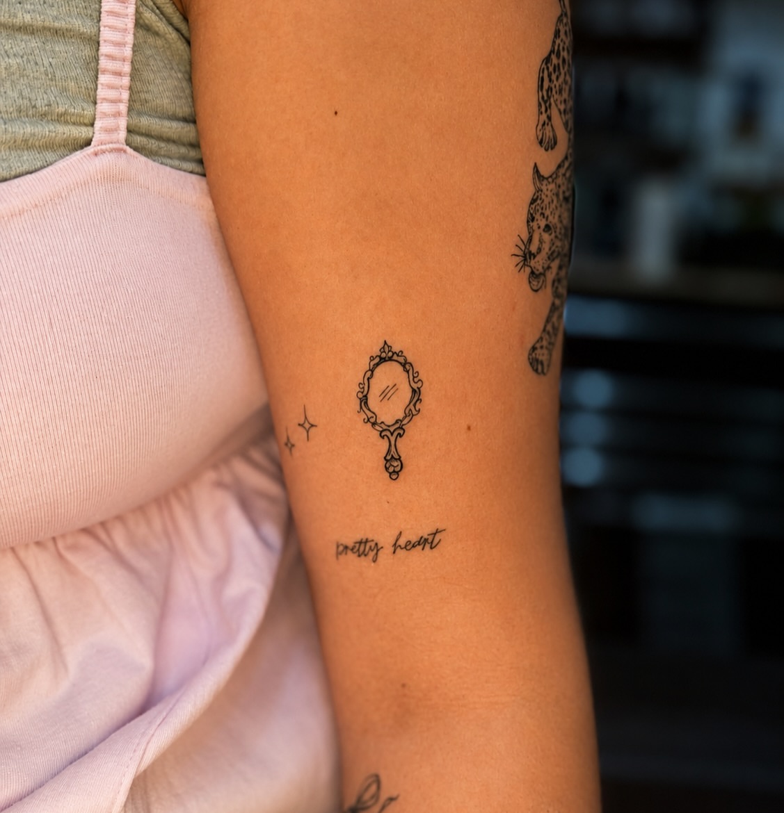 Mirror minimalist tattoo on the forearm by JAmy Winters