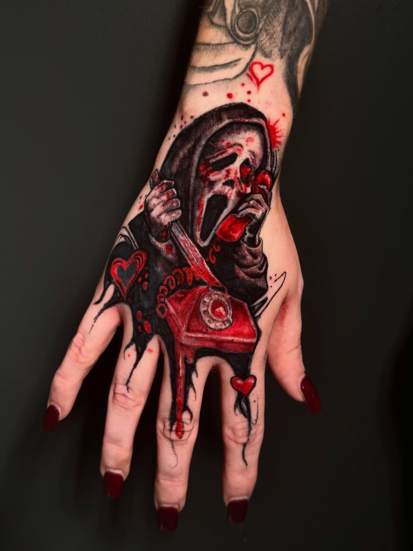 Scream ghost with telephone dark realism tattoo on the hand by Noah A Rasmus