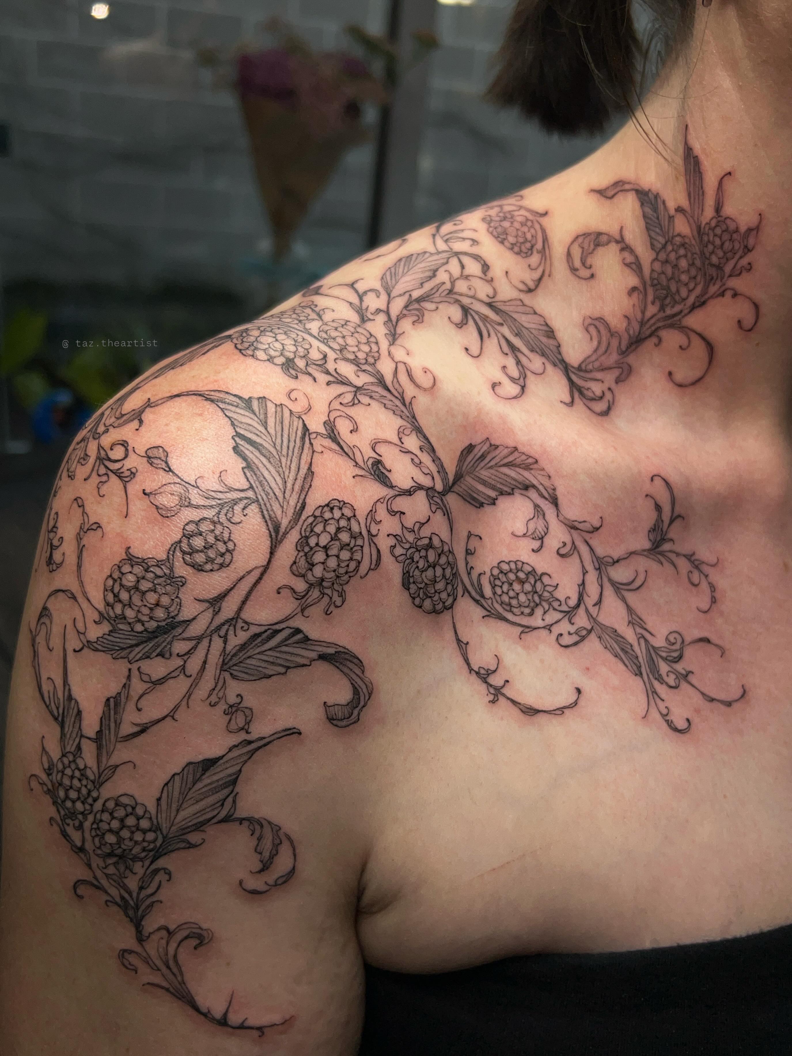 Pineapple and berries black and grey tattoo on the shoulder by 𝖙𝖆𝖟 🫧✮♡ₐₜₗ ₙᵧʗ