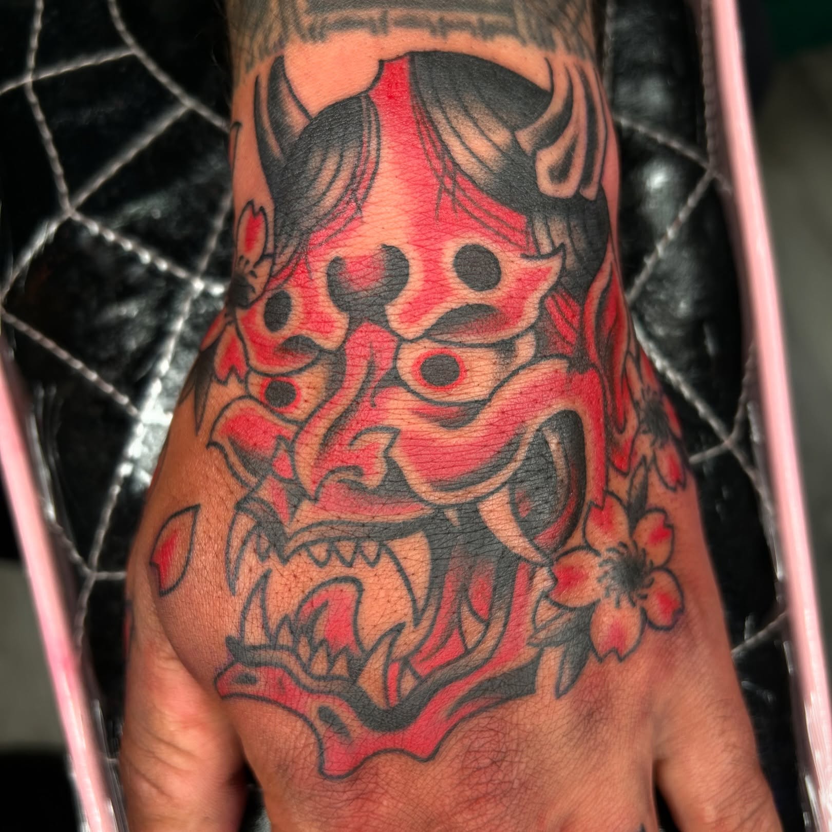 Demon mask japanese irezumi tattoo on the forearm by Audrey Migitsch