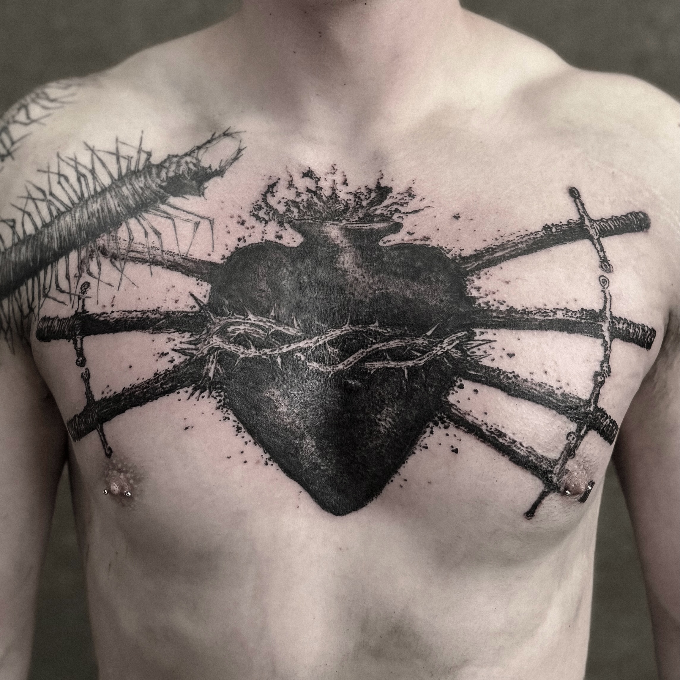 Heart with thorns and sword realism tattoo on the chest by ąʑཞąıą ཞąıŋ