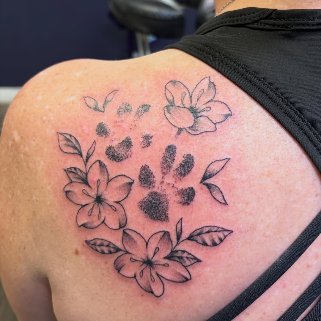Flowers dotwork tattoo on the shoulder by Hailey Hermosillo