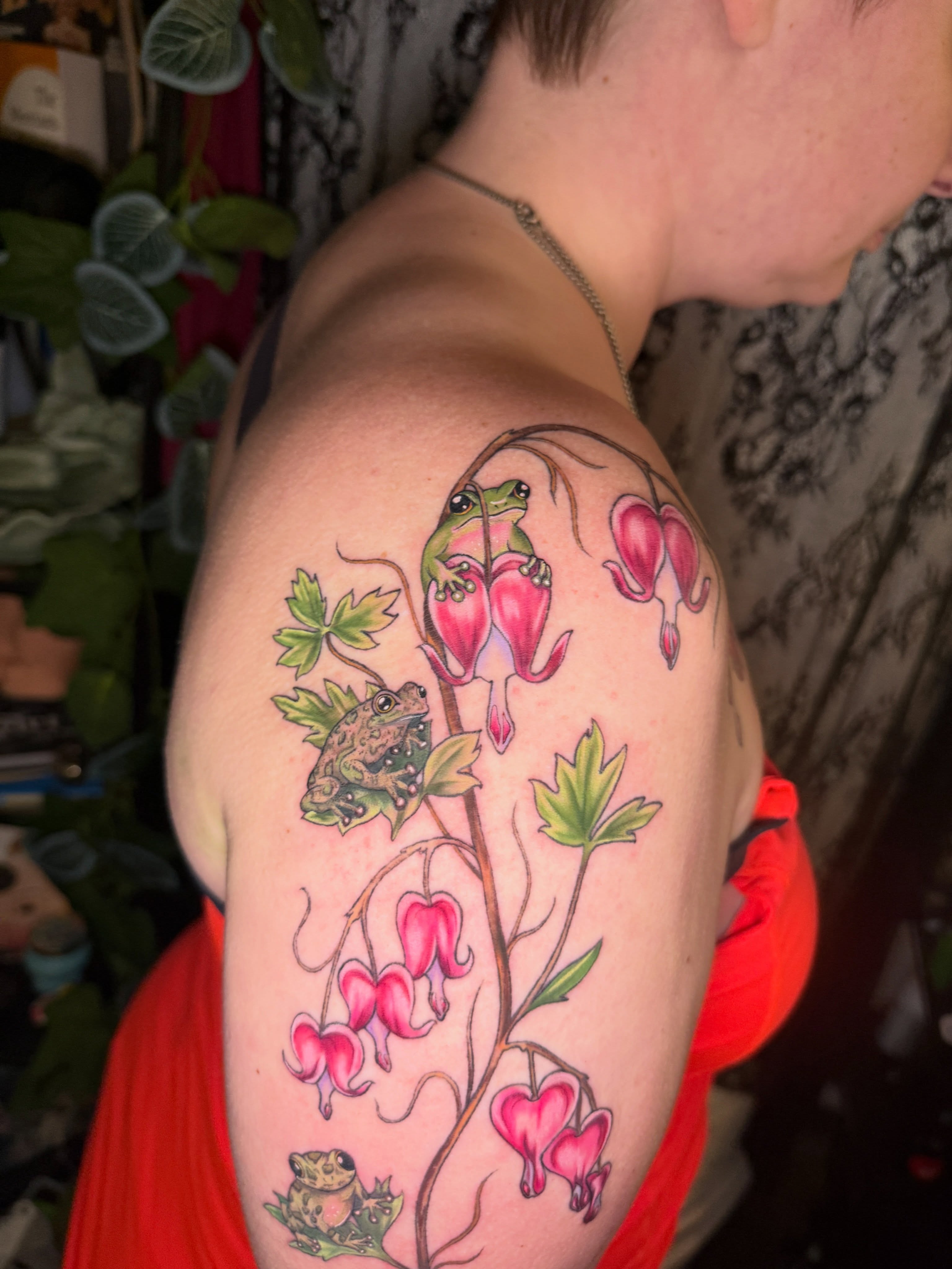 Frogs and bleeding hearts realism tattoo on the shoulder by ✨Syreena✨