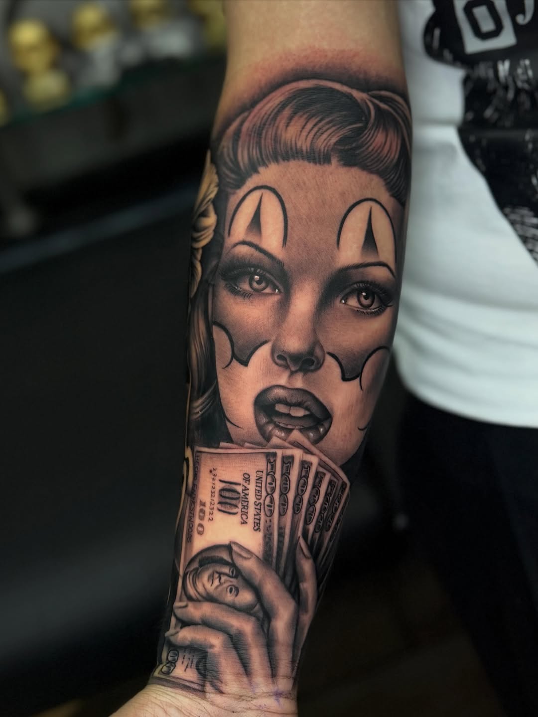 Woman with money Chicano tattoo on the forearm by LOS
