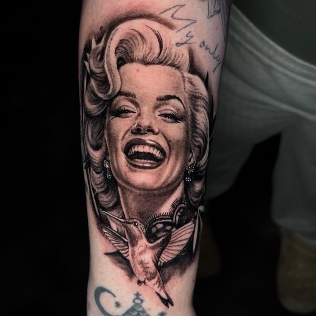 Tattoo by @burkes.body.graphic — realism, black_and_grey