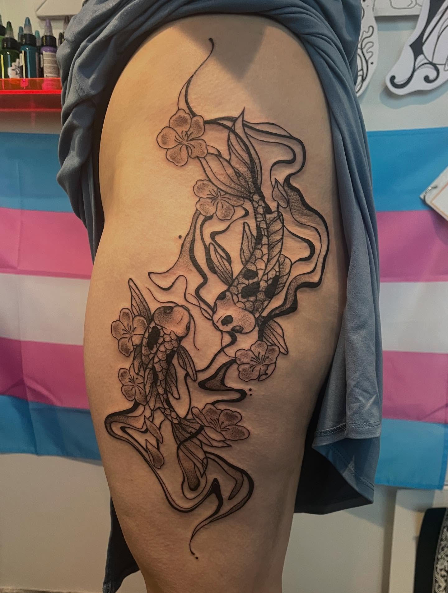 Koi fish and flowers black and grey tattoo on the thigh by 🖤Jess Pereira🖤, Framingham, Massachusetts
