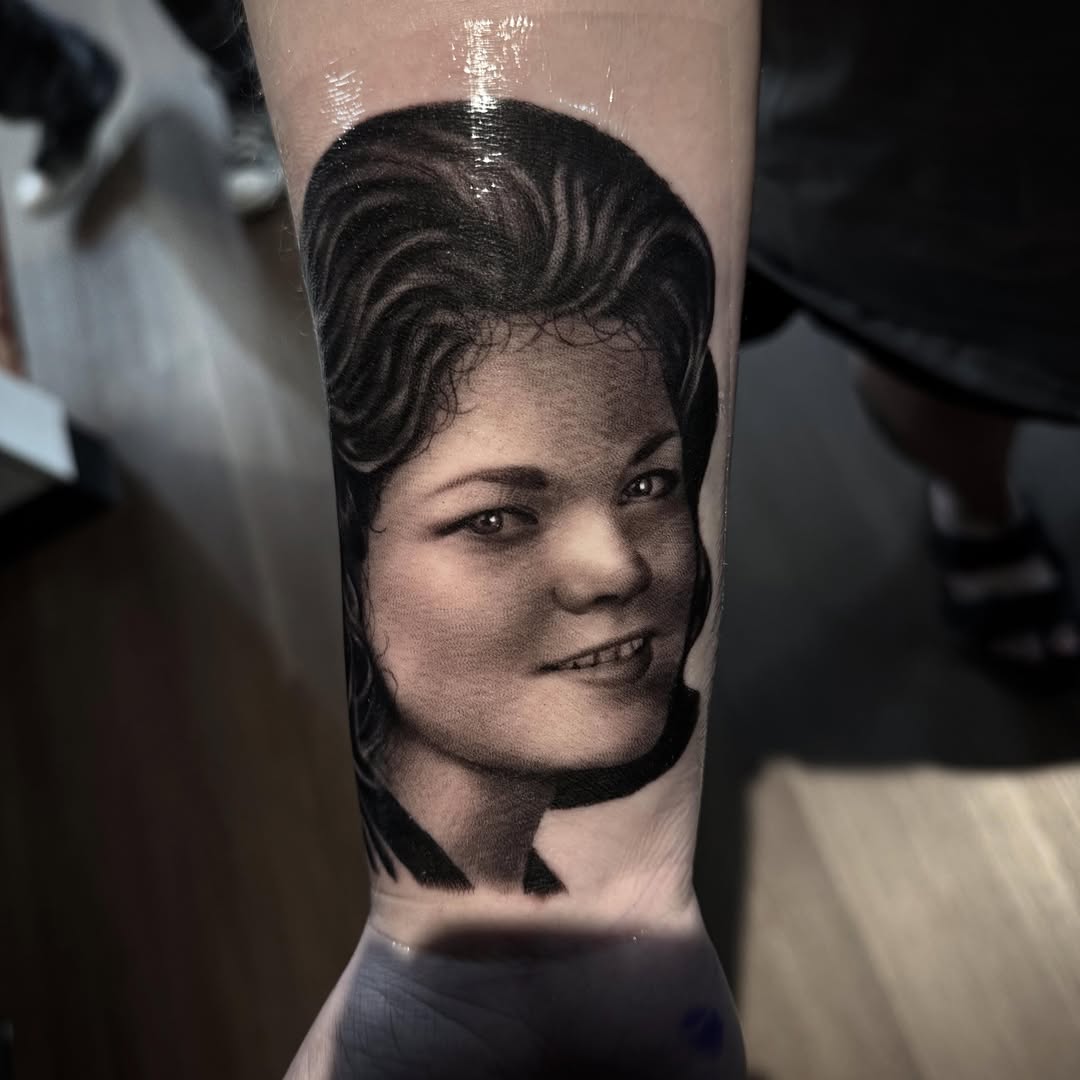 Portrait of a woman realism tattoo on the forearm by Tony Garcia