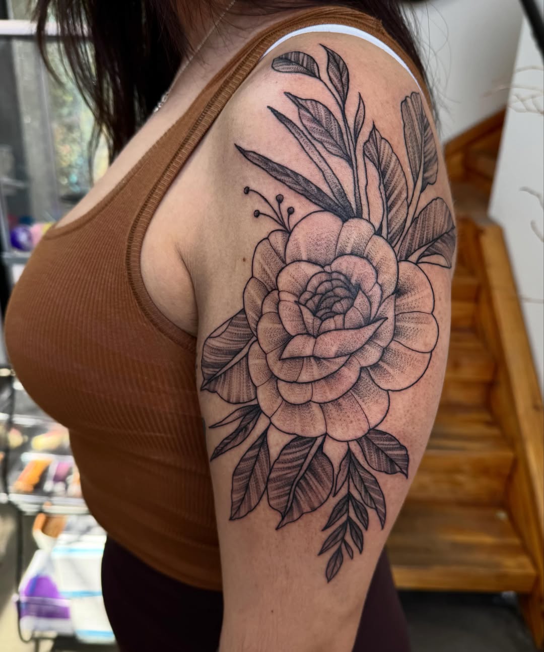 Rose black and grey tattoo on the shoulder by Kyrsta Lannigan (she