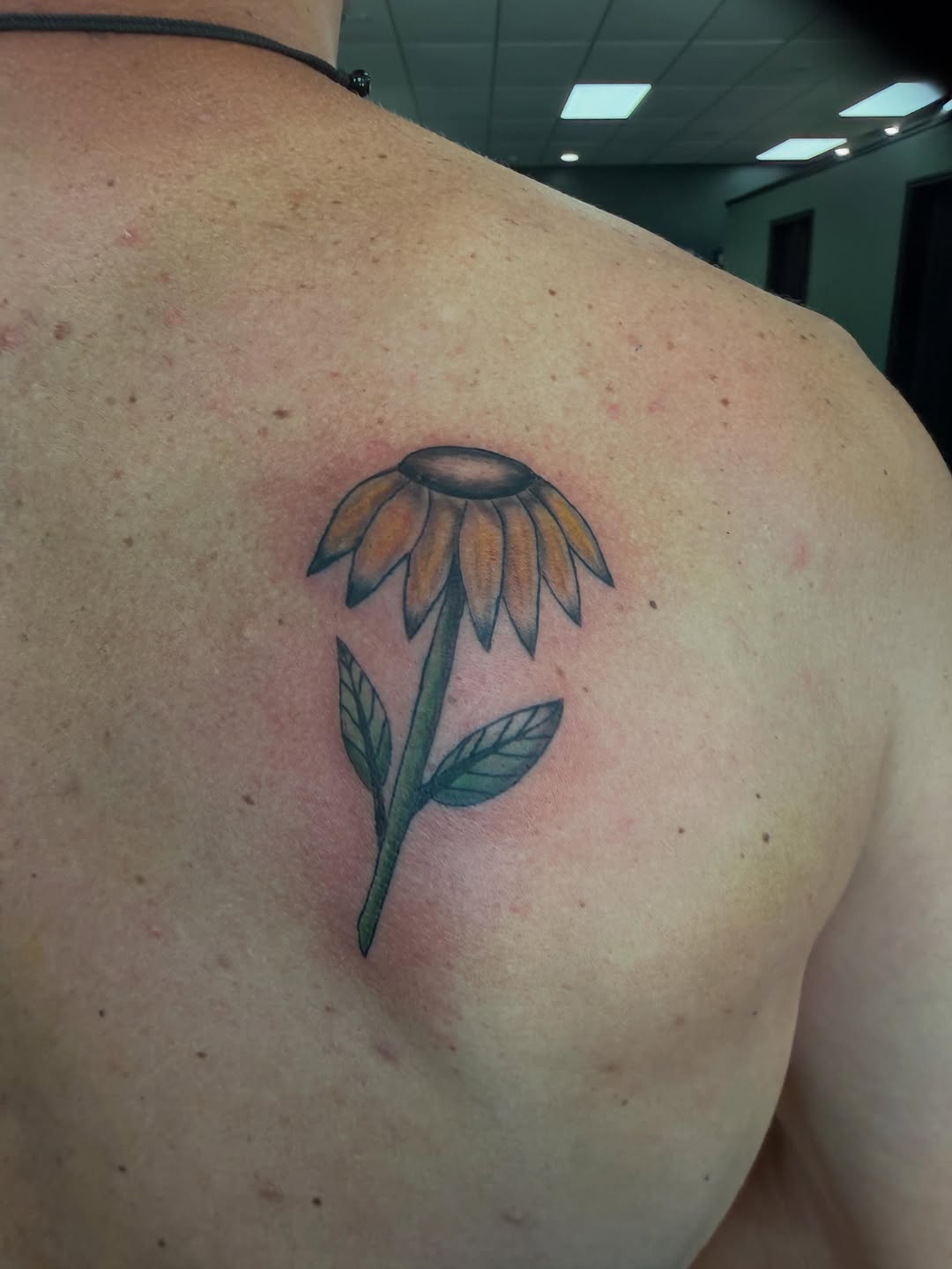 Flower tattoo on the shoulder by K. Bel Art
