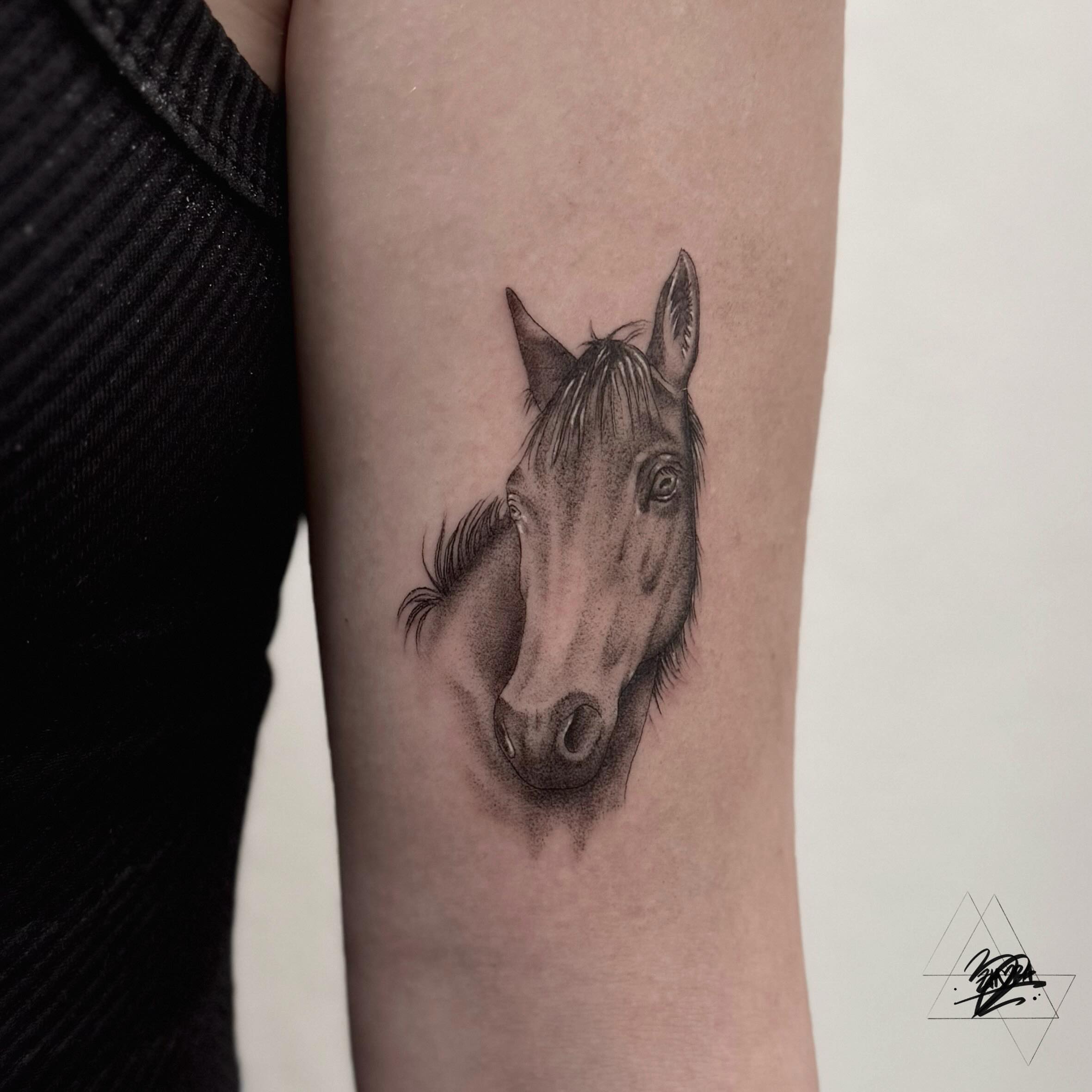 Horse head realism tattoo on the forearm by Zhorana Devi