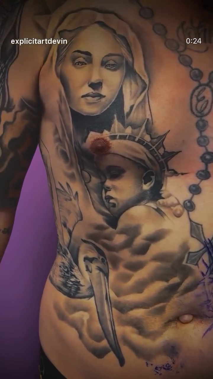 Religious figures and lion realism tattoo by Devin Johnson, Forest Park, Georgia