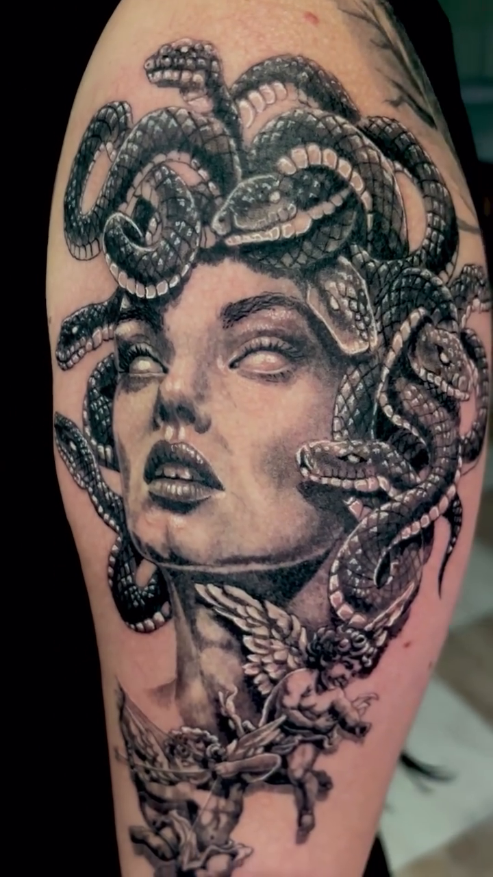 Medusa portrait realism tattoo on the forearm by Molatutattoo