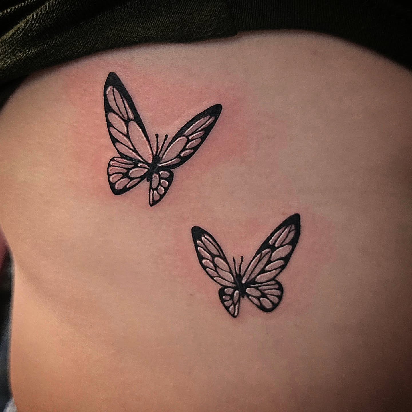Butterfly black and grey tattoo on the torso by Danielle Elizabeth