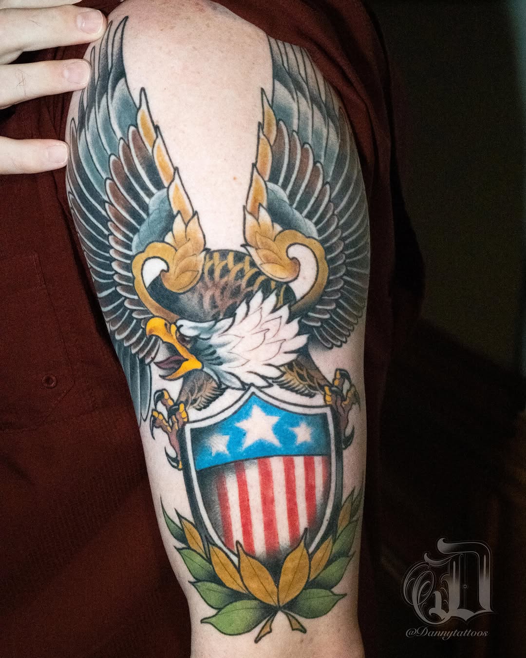 Eagle and shield American traditional tattoo on the forearm by Danny Pando