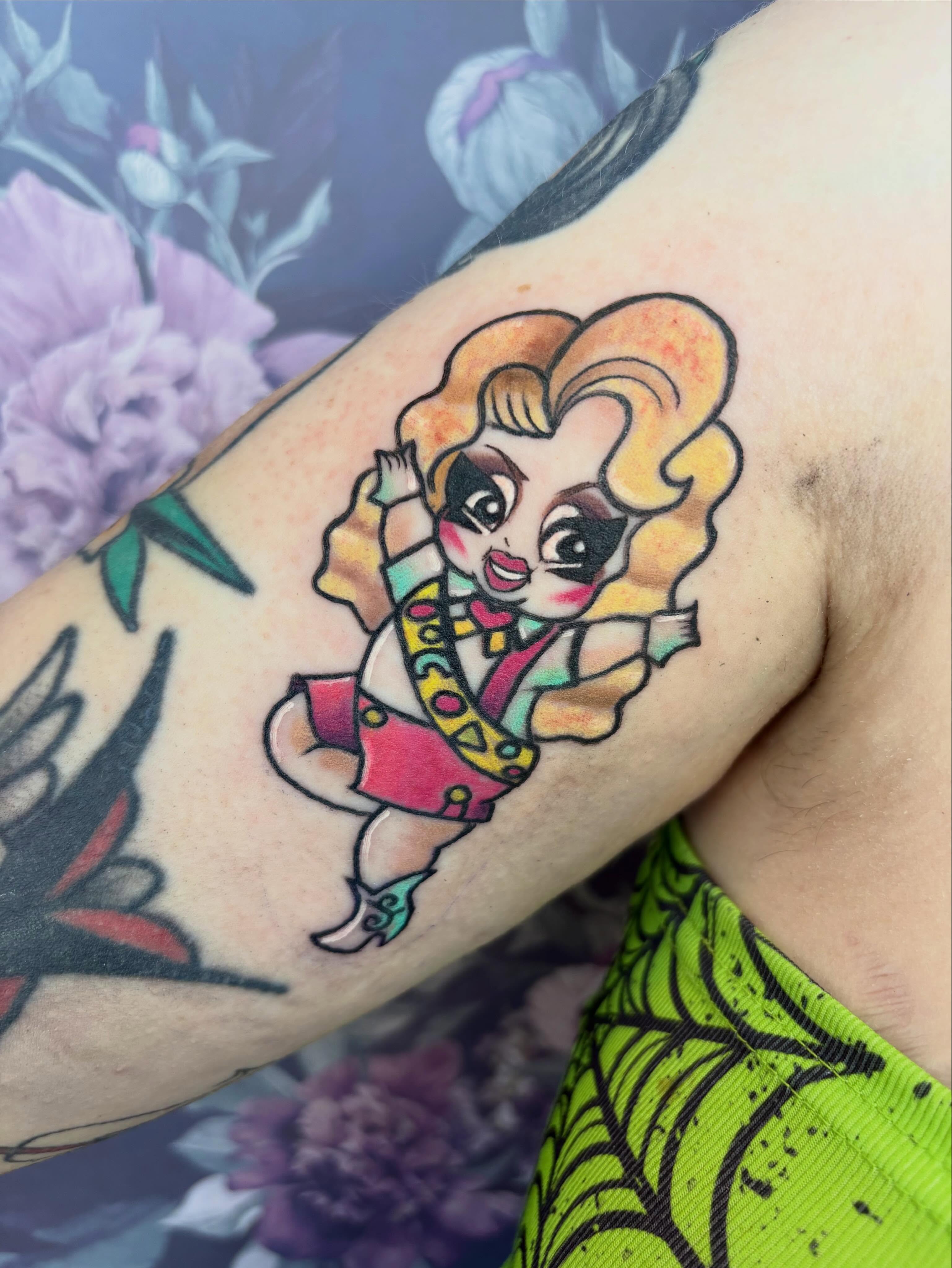 Cartoon character new school tattoo on the forearm by Bre Alex