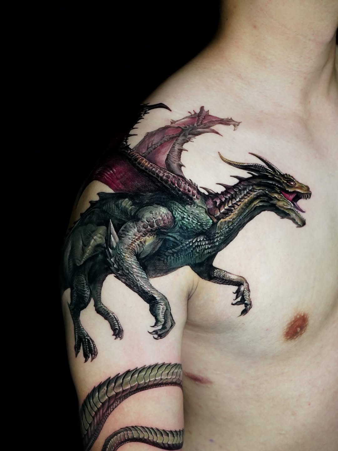 Dragon watercolor tattoo on the shoulder by Eun, Toronto, Ontario