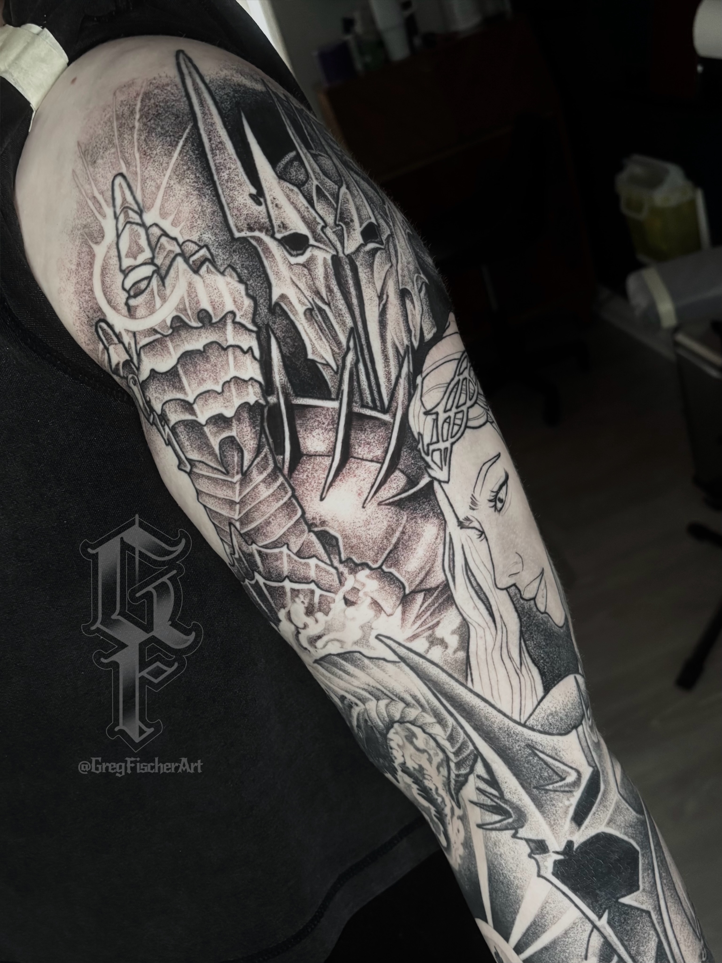 Dragon realism tattoo on the forearm by Greg Fischer