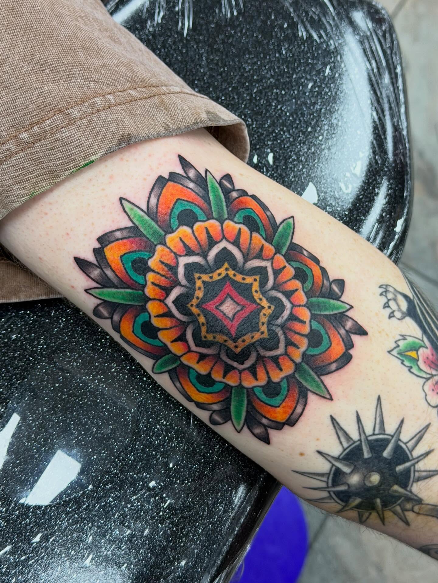Mandala American traditional tattoo on the forearm by Olivia Norbert