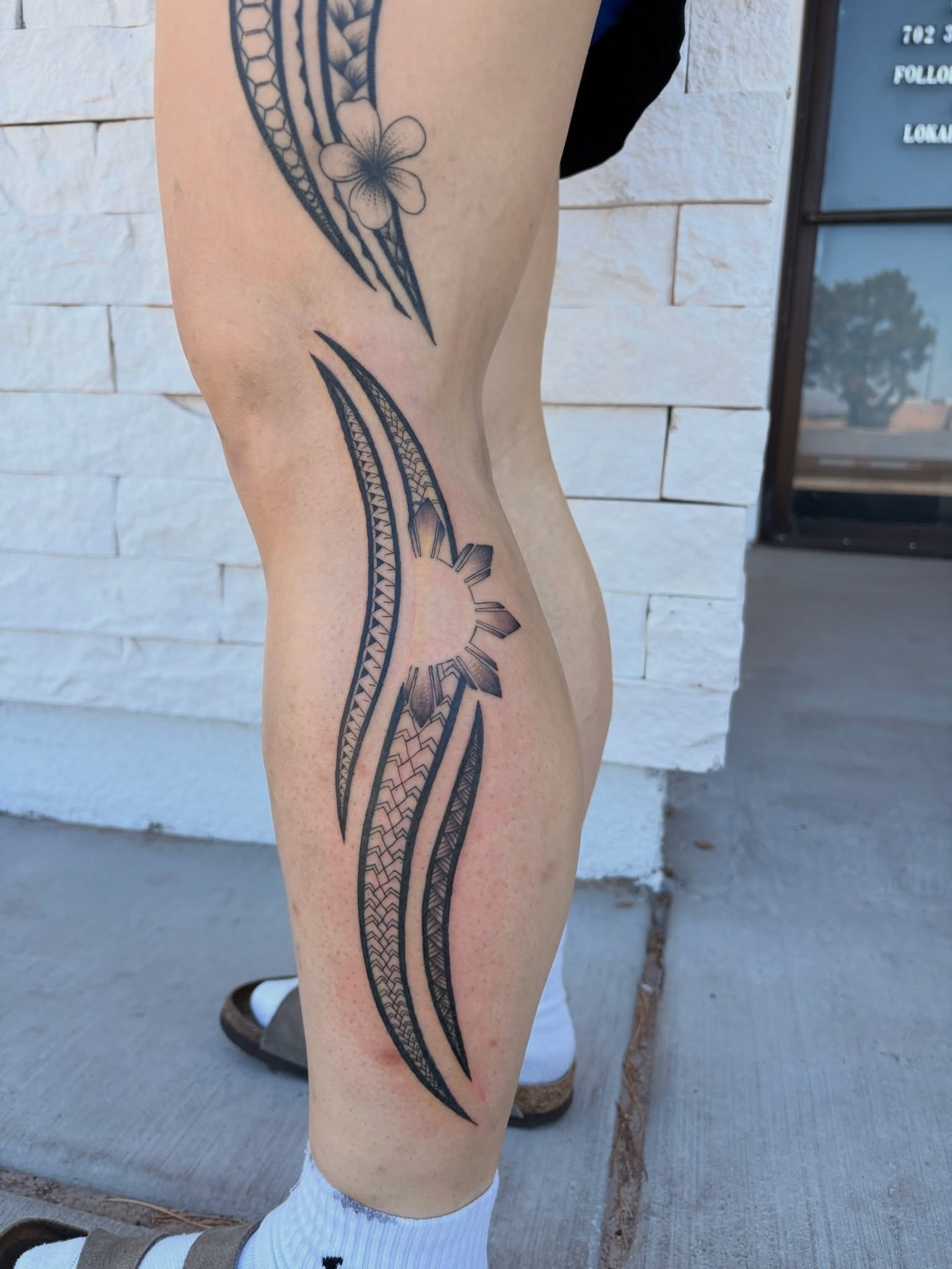 Tribal sun and flower tribal tattoo on the leg by tati 🇬🇺🇵🇭