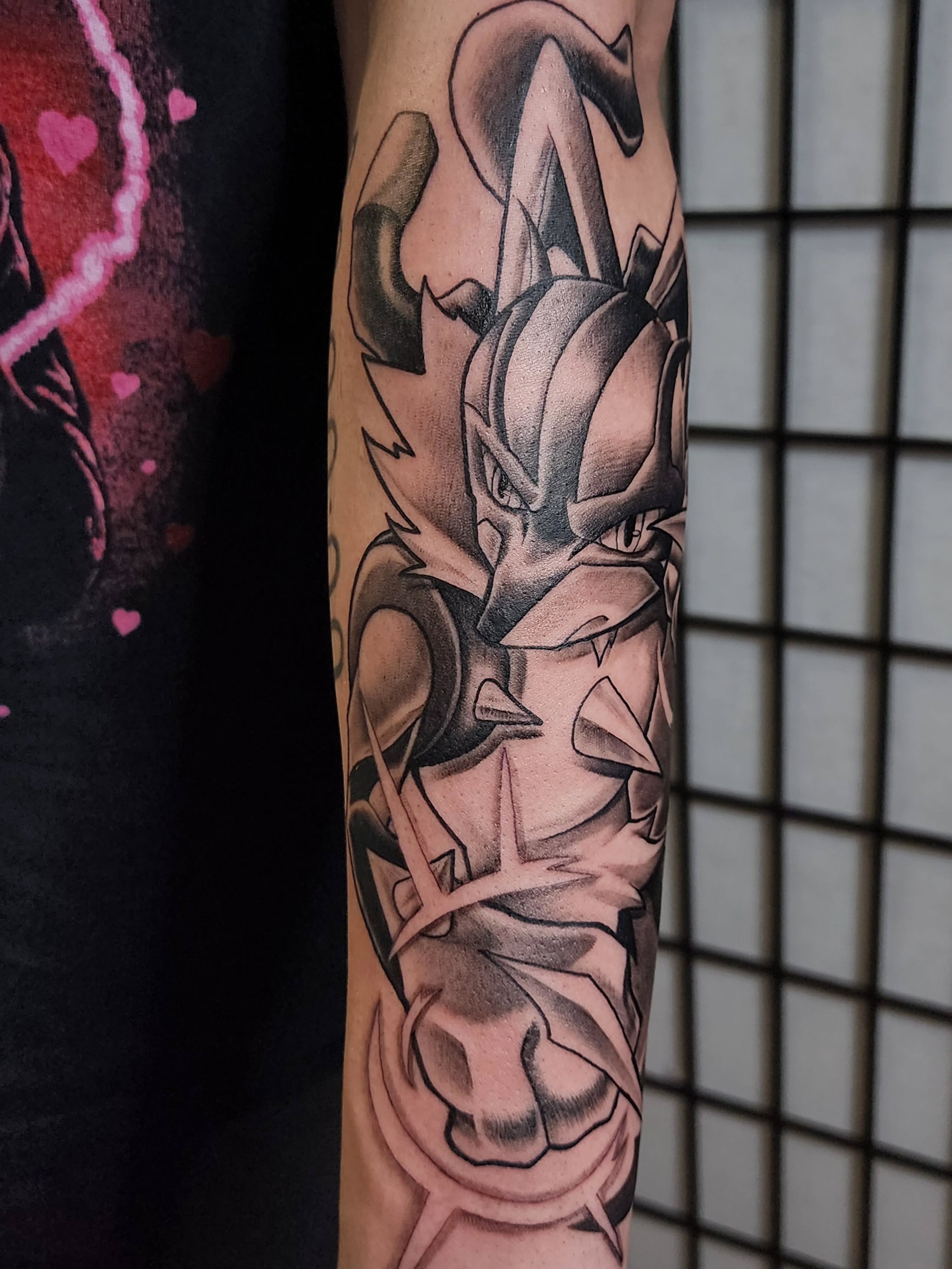 Dragon ball character geometric tattoo on the forearm by Anthony Moncada