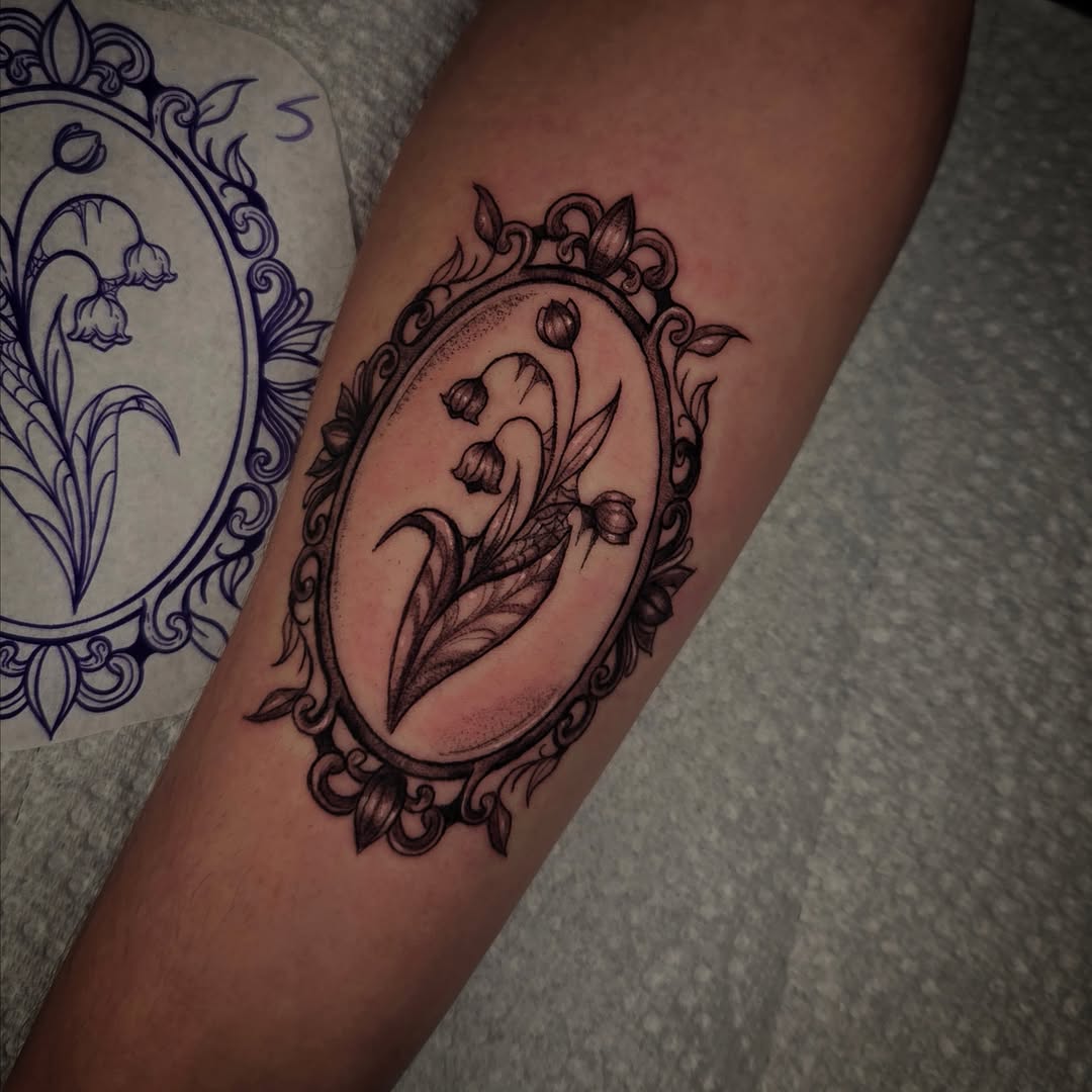 Lily of the valley black and grey tattoo on the forearm by Devin 🖤
