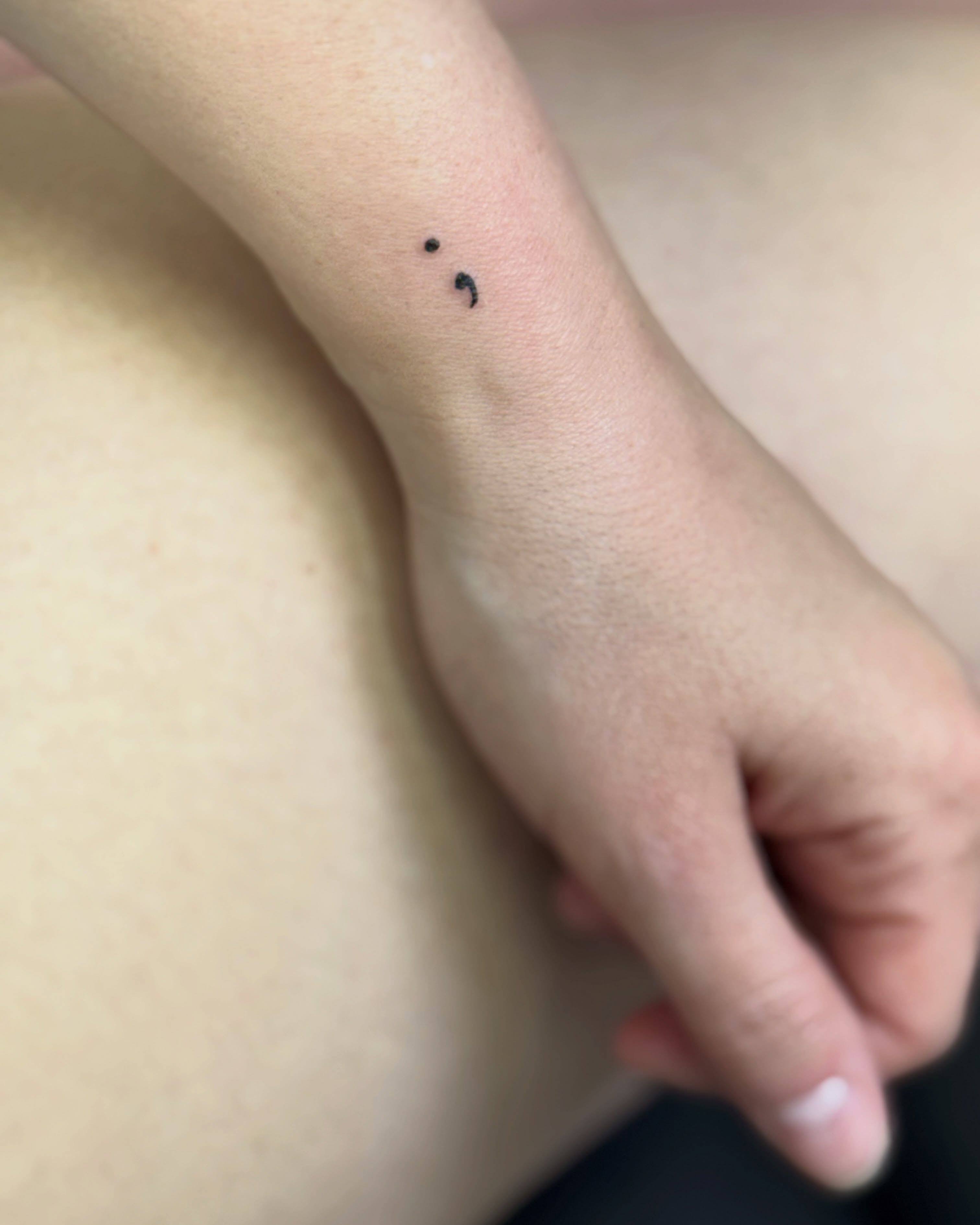 Semicolon dotwork tattoo on the forearm by Fineline Tattoo