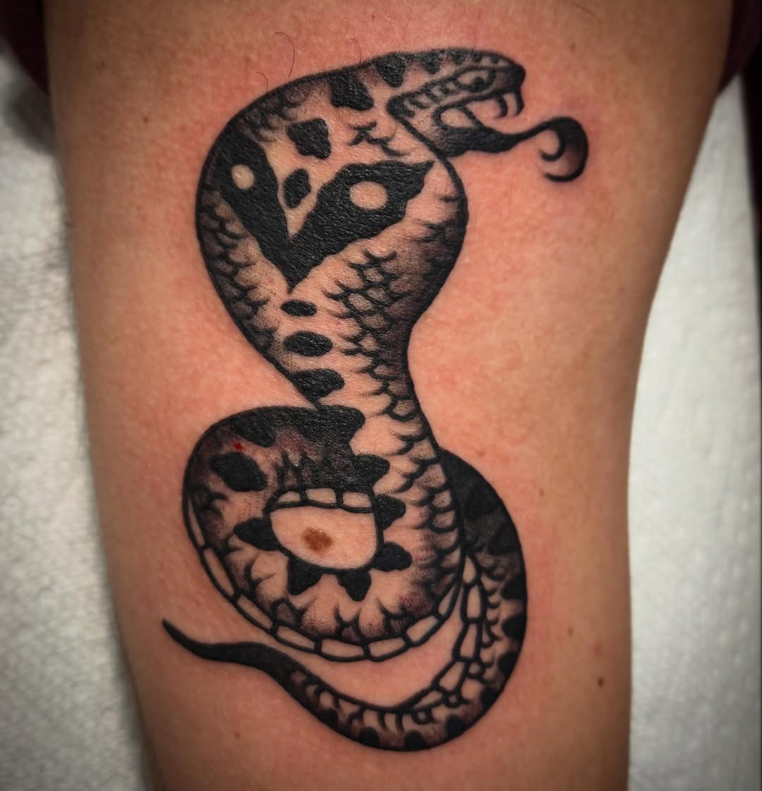 Snake black and grey tattoo on the forearm by Danny DiBlasi, San Francisco, California