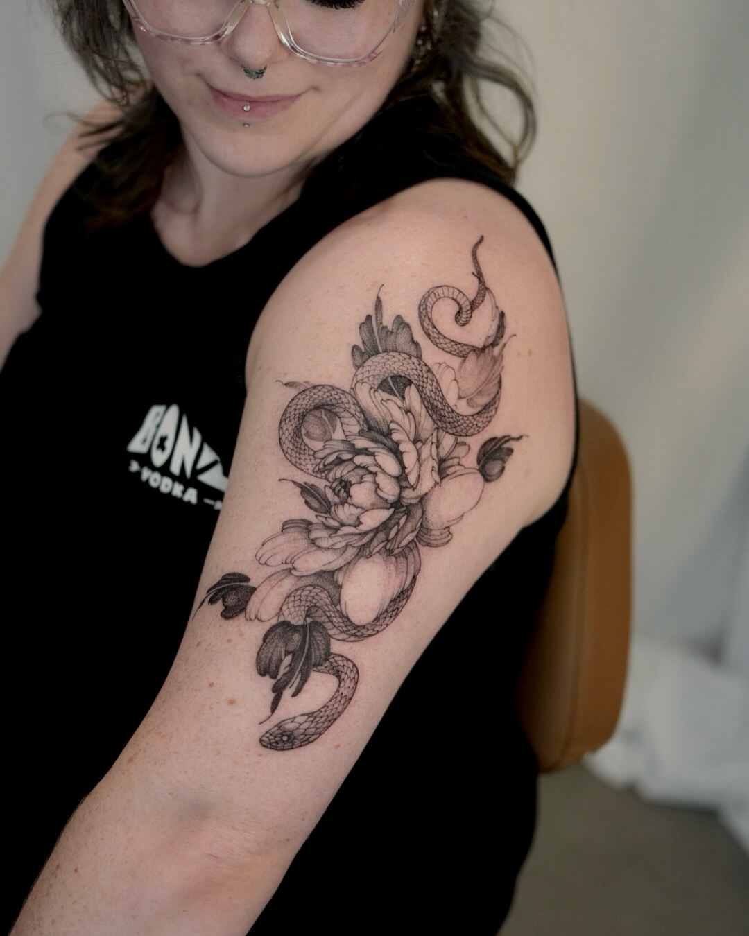 Snake and peony realism tattoo on the shoulder by Joy, Gold Coast, Queensland