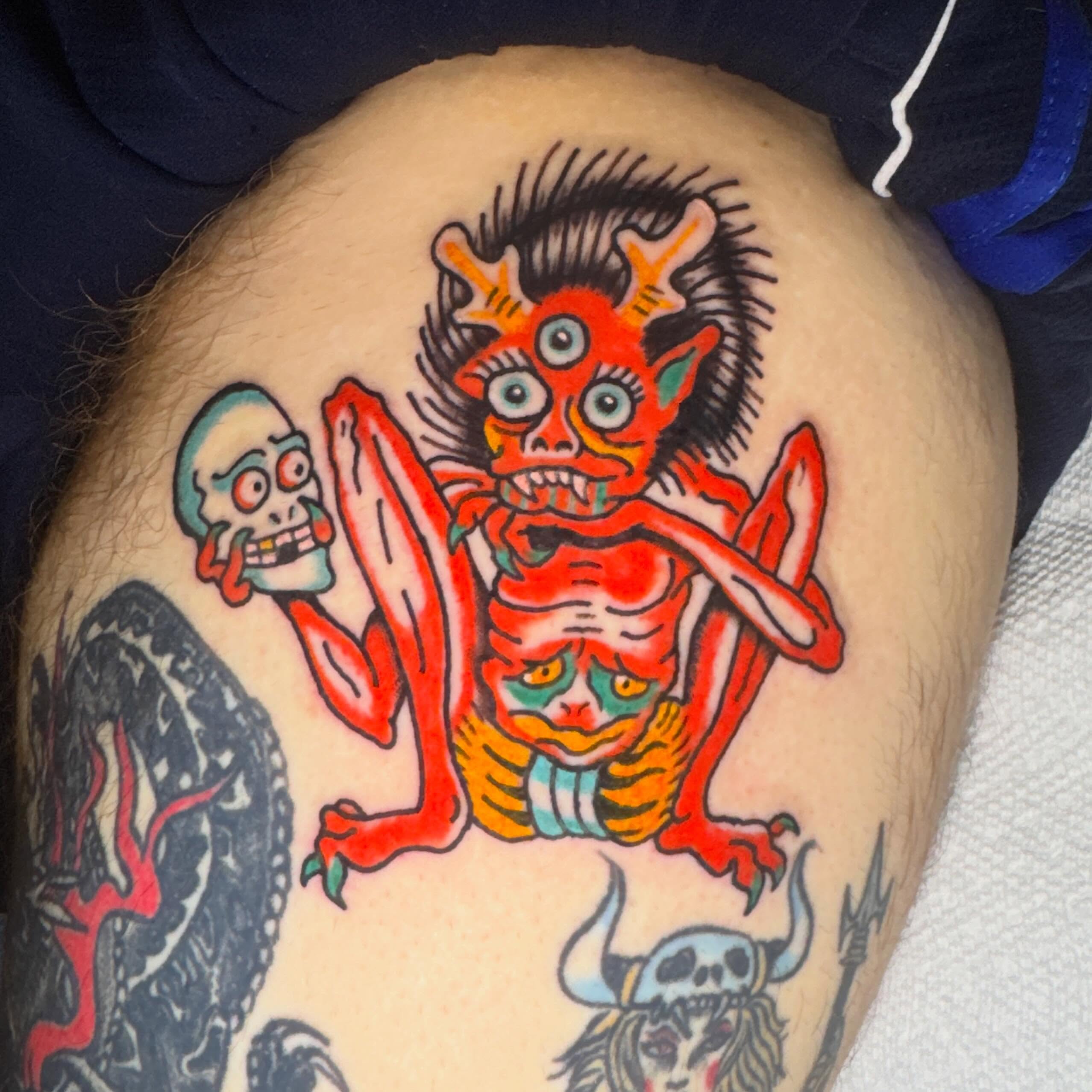 Demon and skeleton American traditional tattoo on the thigh by Harrison ♠️