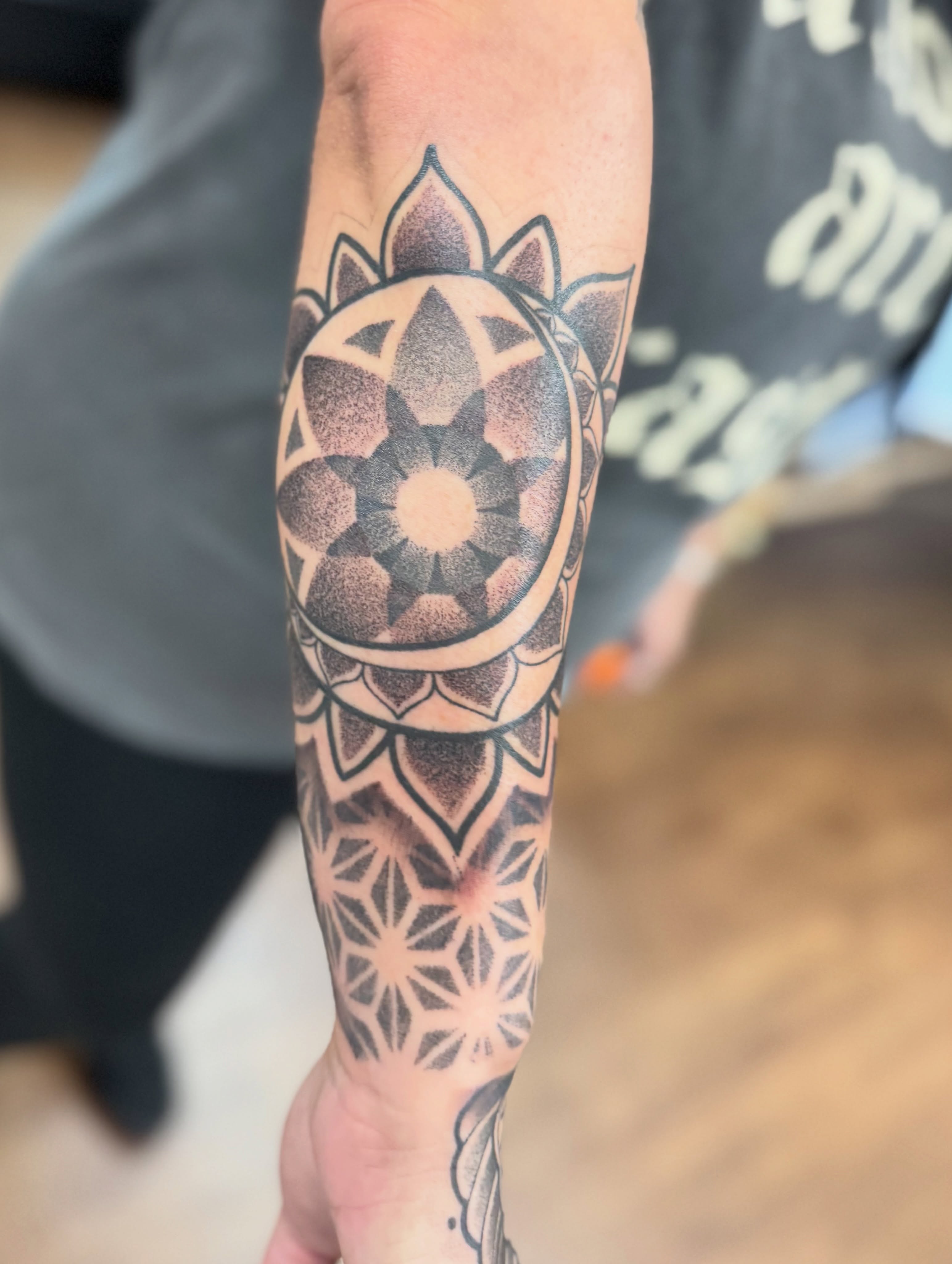 Tattoo by @tattoosbyjuju_ — dotwork, geometric