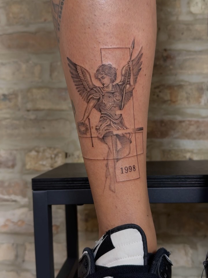 Angel with shield and spear dotwork tattoo on the calf by Tattoo Yulia Kononenko
