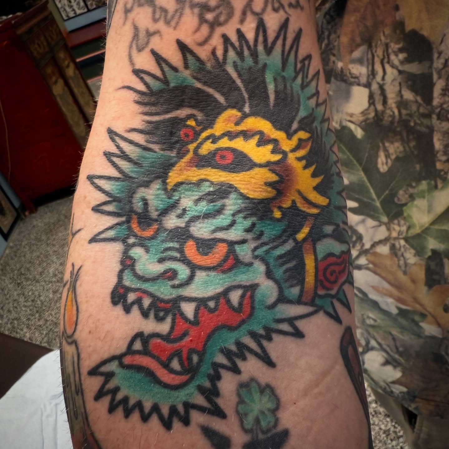 Dragon American traditional tattoo on the forearm by Chuck Paprocki, Nashville, Tennessee